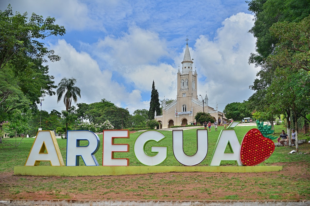 Areguá main church and welcome sign