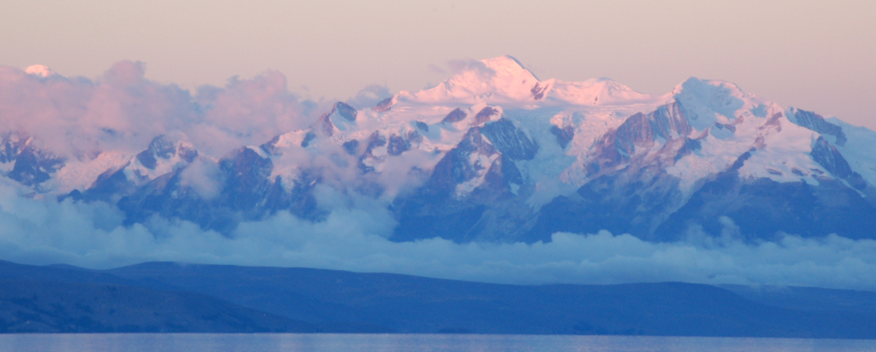 This is Mount Ancohuma, the third highest mountain in Bolivia just east of Lake Titicaca. Save for the crop and a little bit of cloning to get rid of some sensor dirt, this photograph is pretty much presented as taken.