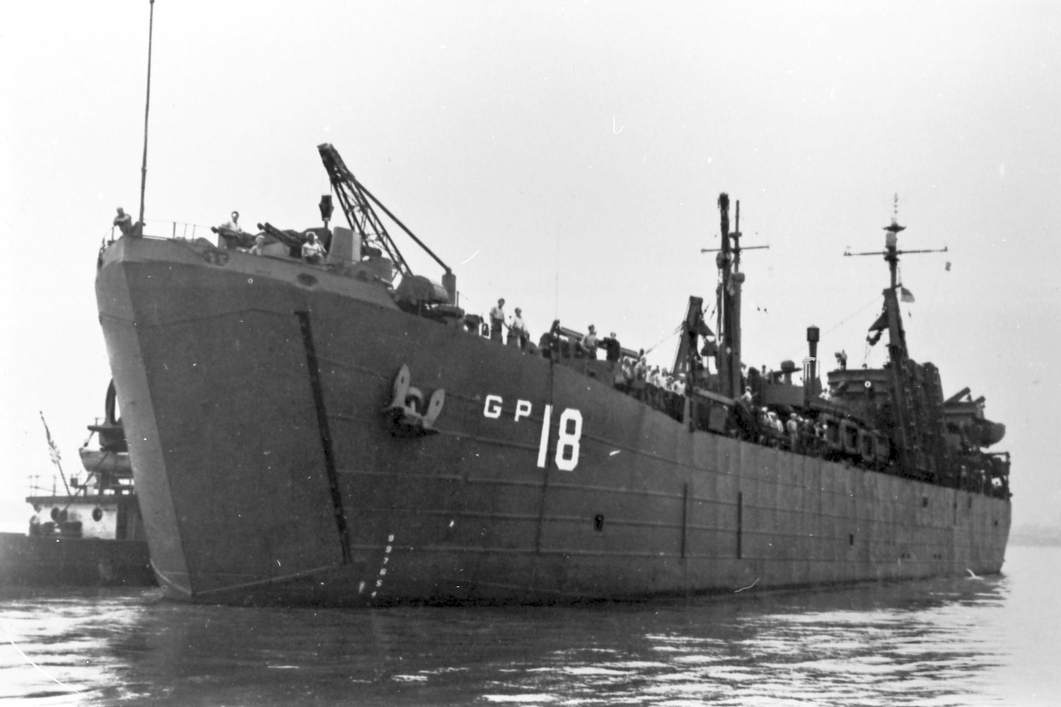 The U.S. Navy motor torpedo boat tender USS Chiron (AGP-18), circa in 1945. She is painted in Camouflage Measure 21.