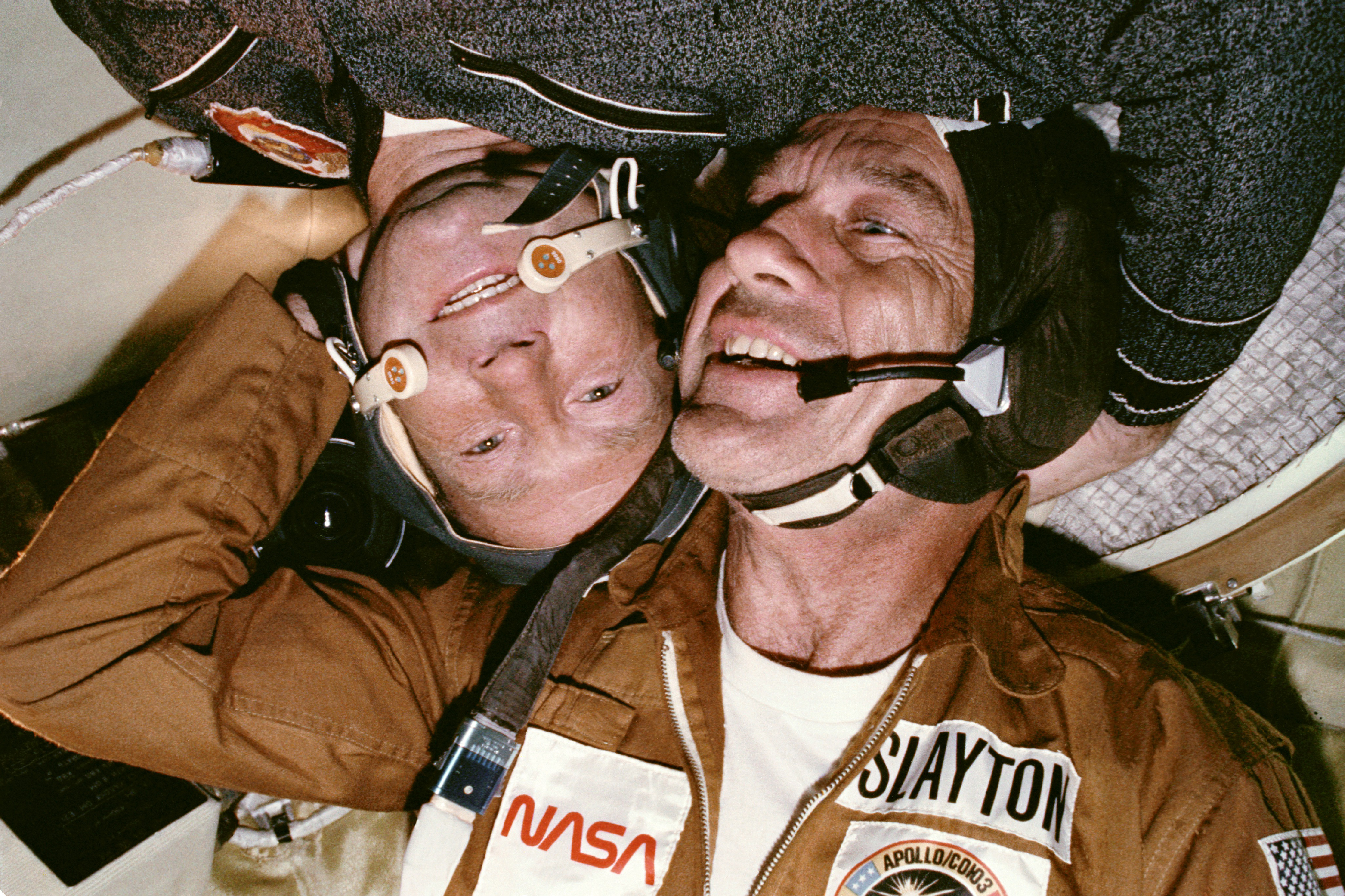 Astronaut Donald K. "Deke" Slayton and cosmonaut Alexey A. Leonov in the Soyuz Orbital Module during the Apollo–Soyuz Test Project. This picture was taken with a 35 mm camera.