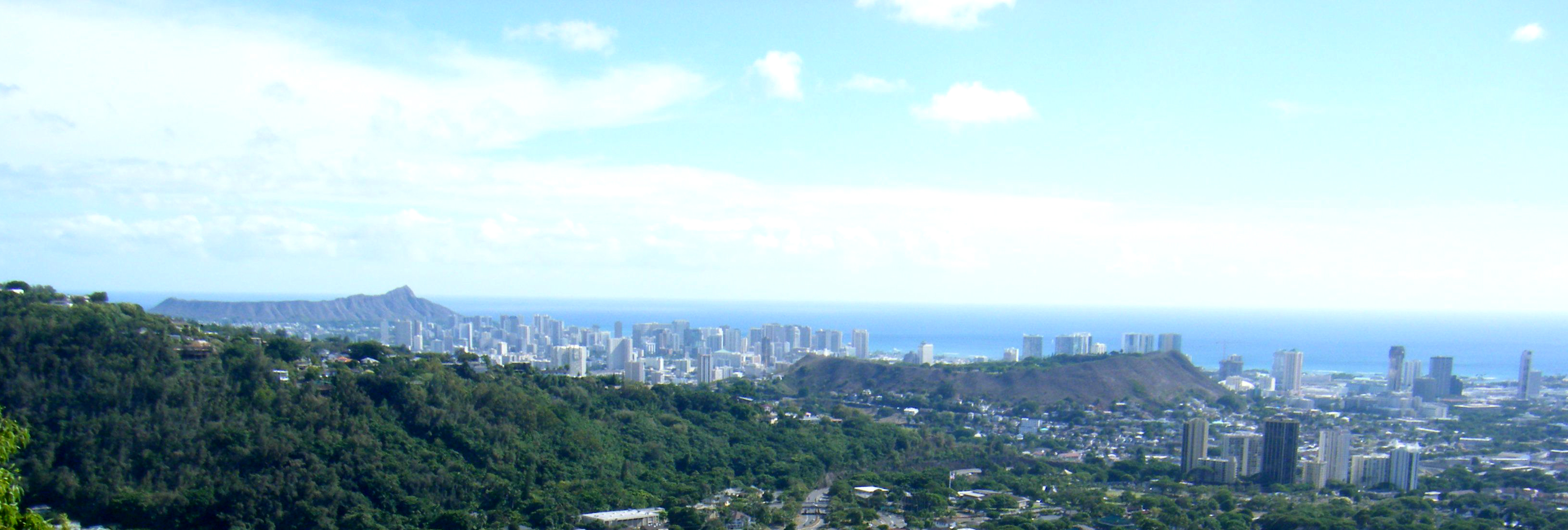 Diamond head (left), Punchbowl crater (center right) and Honolulu from Na Pueo park