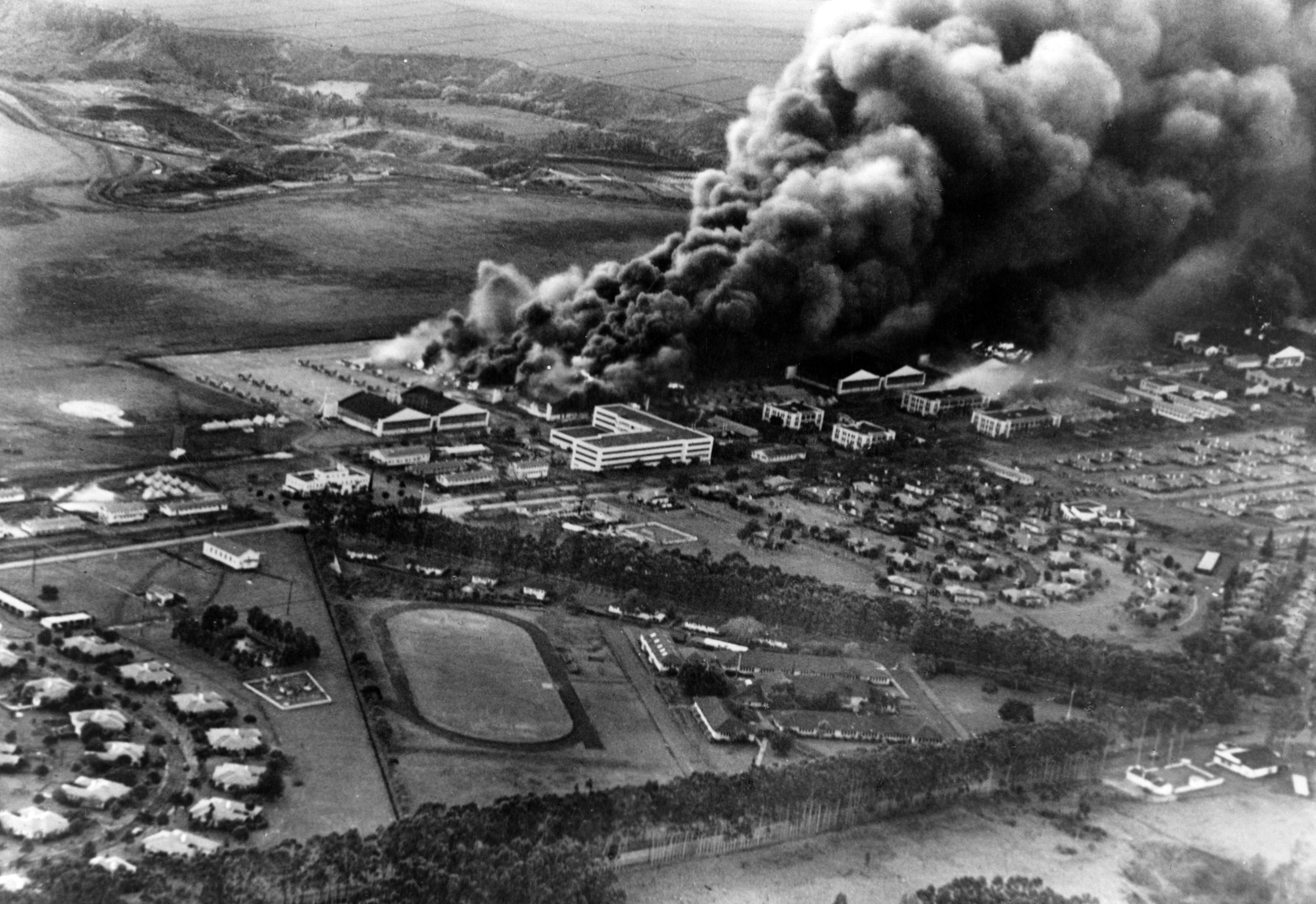 Planes and hangars burning at Wheeler Field during the Japanese attack on Pearl Harbor, 7 December 1941.