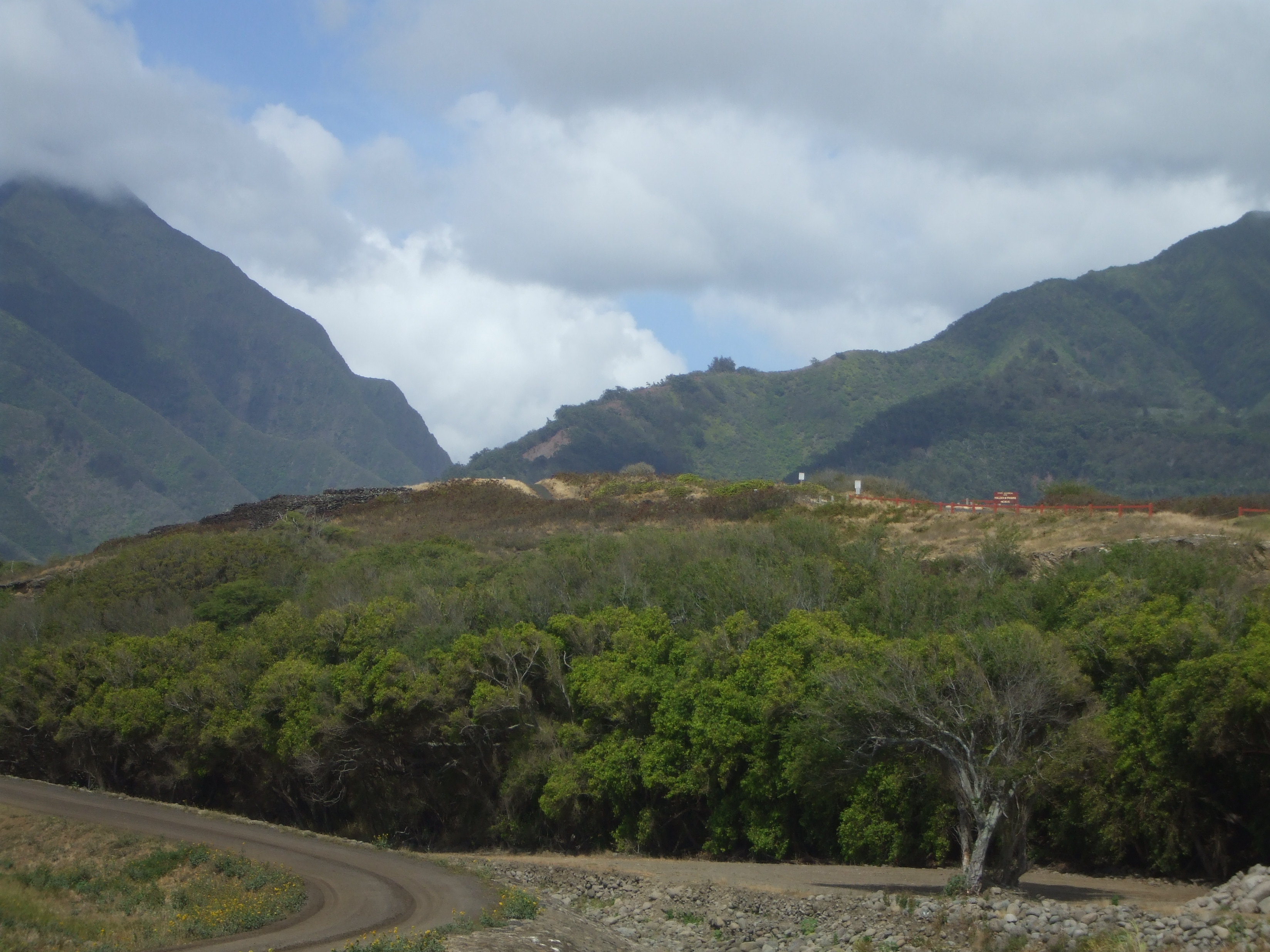 Haleki'i-Pihana Heiau State Monument looking from the bridge across the Iao Stream in Pakukalo/Waiehu.