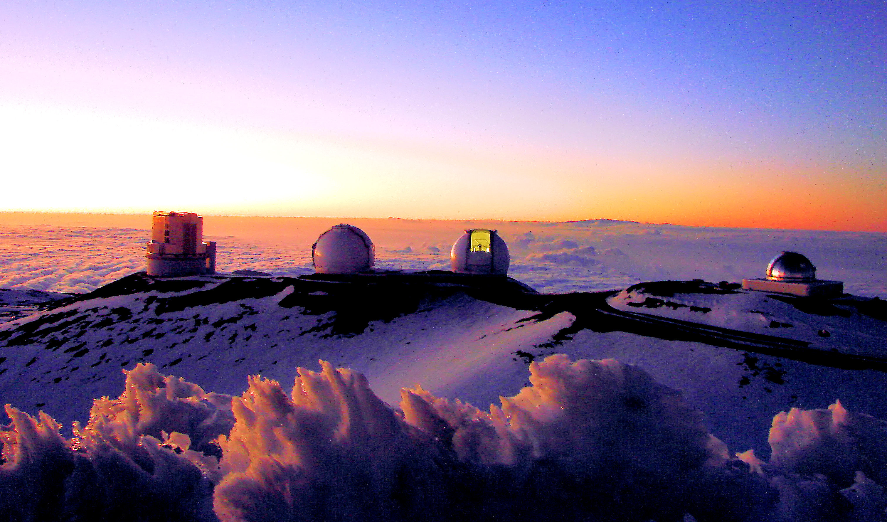 Telescopes of the Mauna Kea Observatory, Hawaii. Visible is the Subaru Telescope, W. M. Keck Observatory, and the NASA Infrared Telescope Facility.