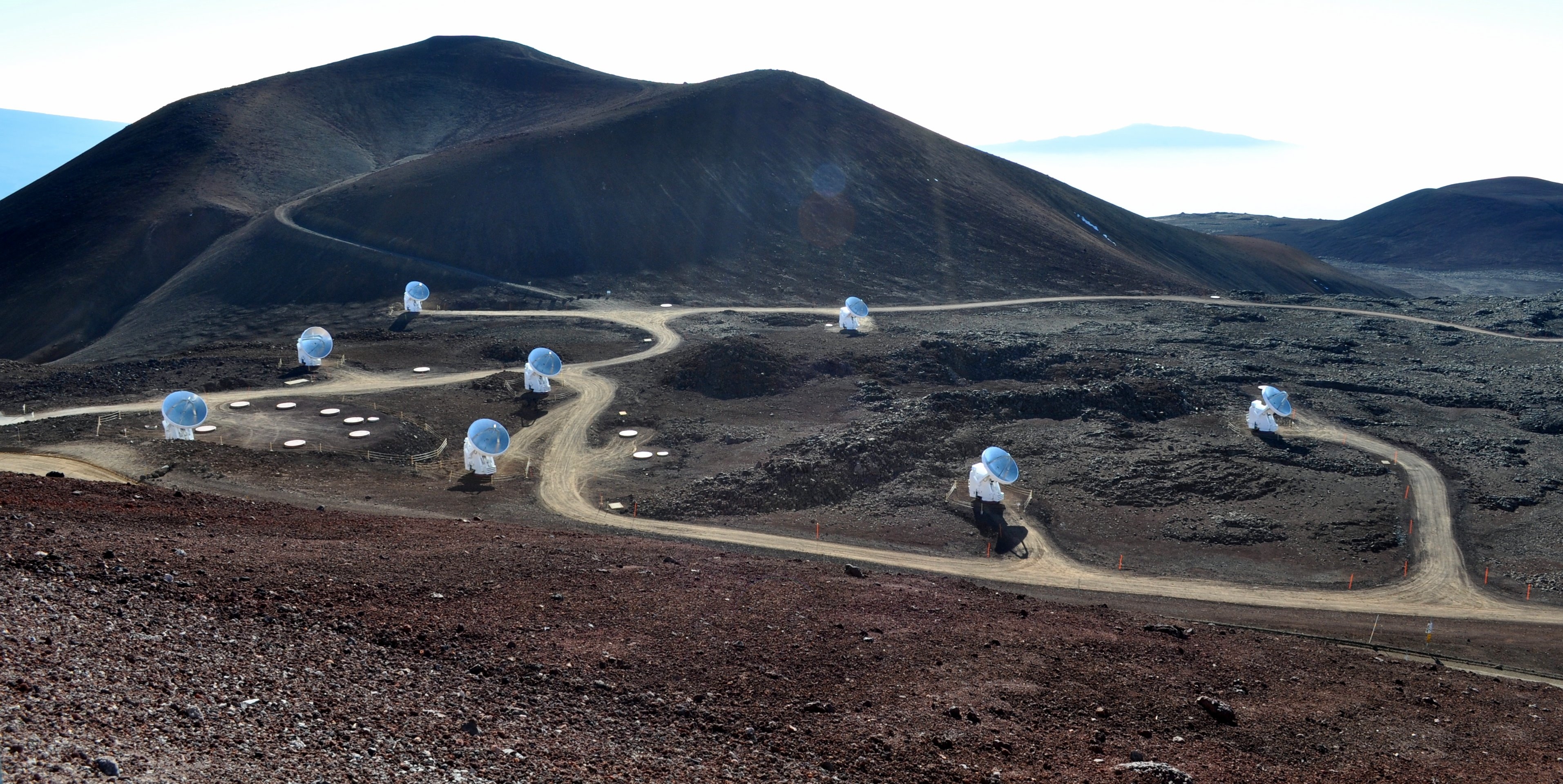 The eight radio telescopes of the Smithsonian Submillimeter Array, located at the Mauna Kea Observatory in Hawai'i.