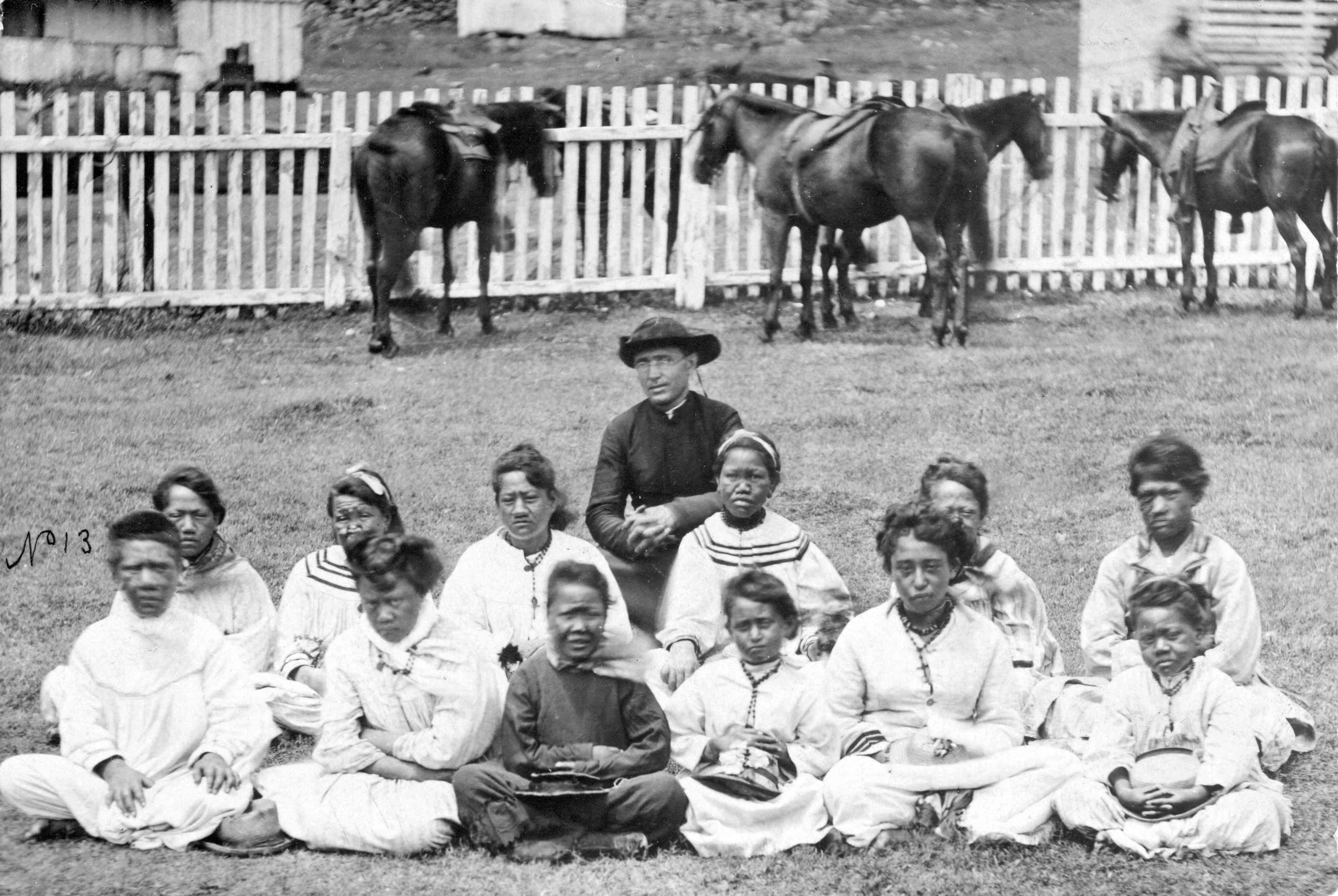 Cathedral of Our Lady of Peace archived image of Father Damien with the Kalawao Girls Choir, at Kalaupapa, Moloka'i, circa 1878. The photo was recently used in the project "The Separating Sickness" in 1997