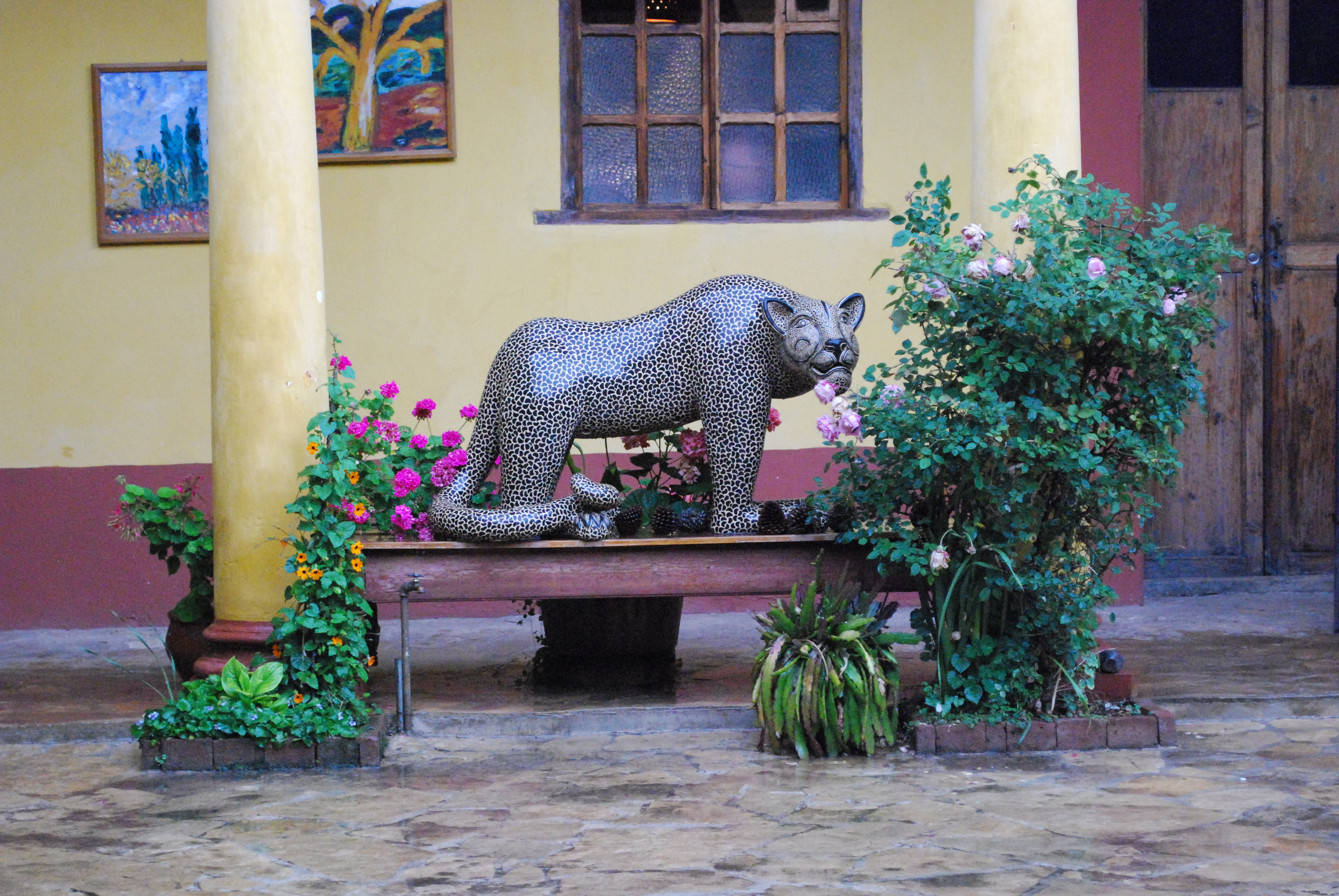 Large sculpture of a wild cat in the back courtyard of Casa Na Bolom in San Cristobal de las Casas, Chiapas, Mexico
