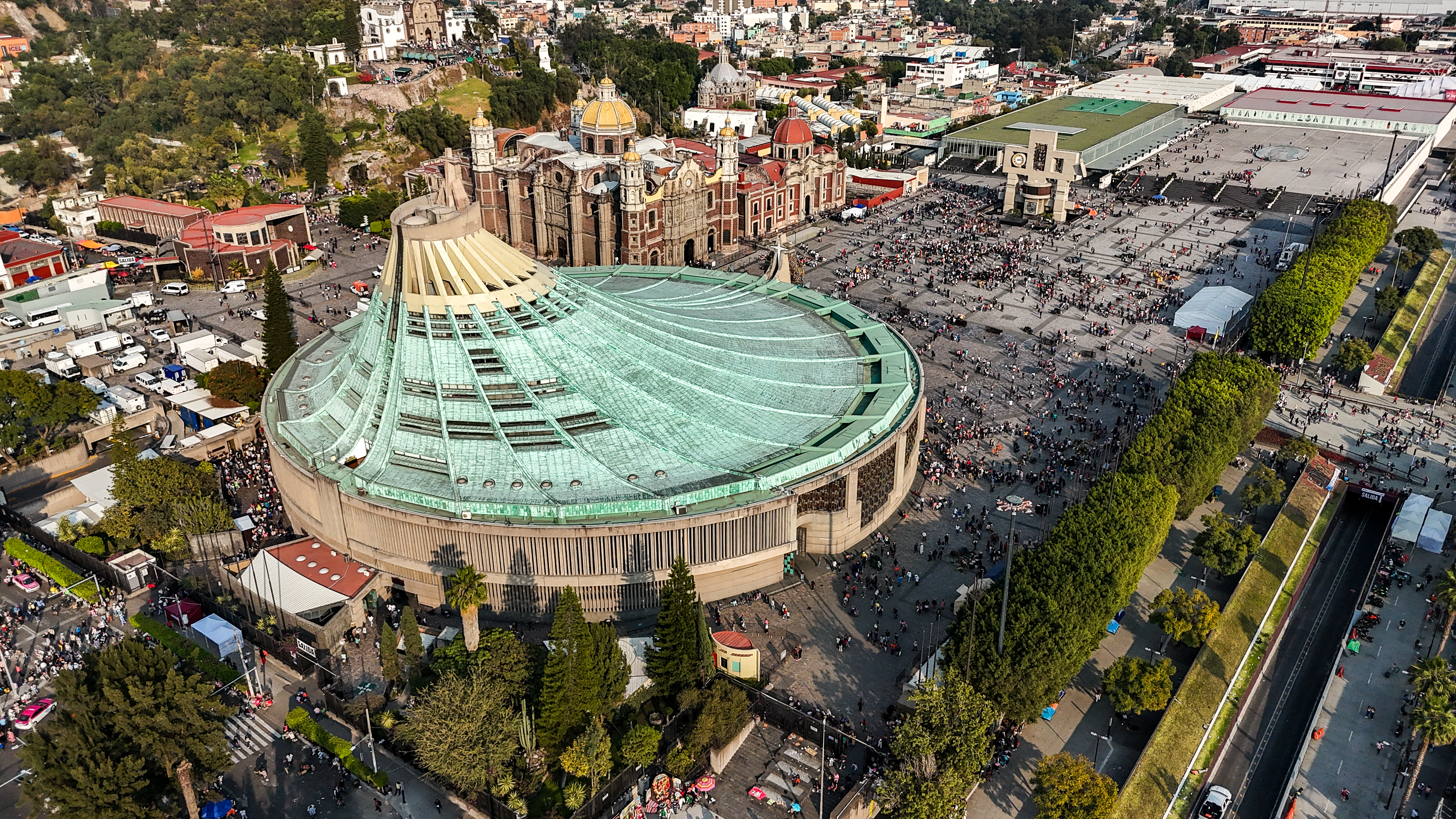 A photograph of the Basilica of Guadalupe in Gustavo A. Madero, Mexico City, Mexico, which was obtained from an aerial perspective using a drone.