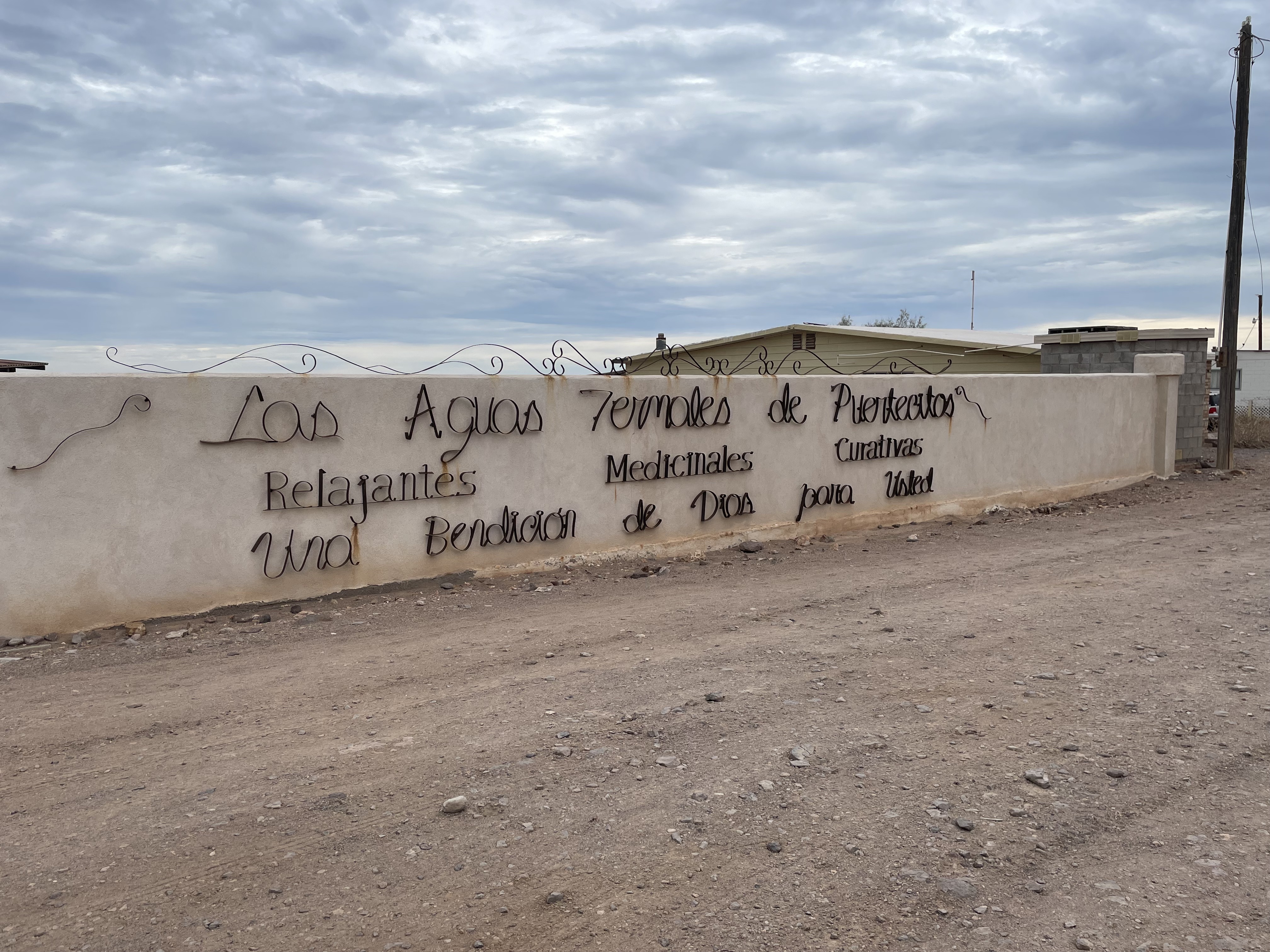 Sign for the hot springs in Puertecitos, Baja California