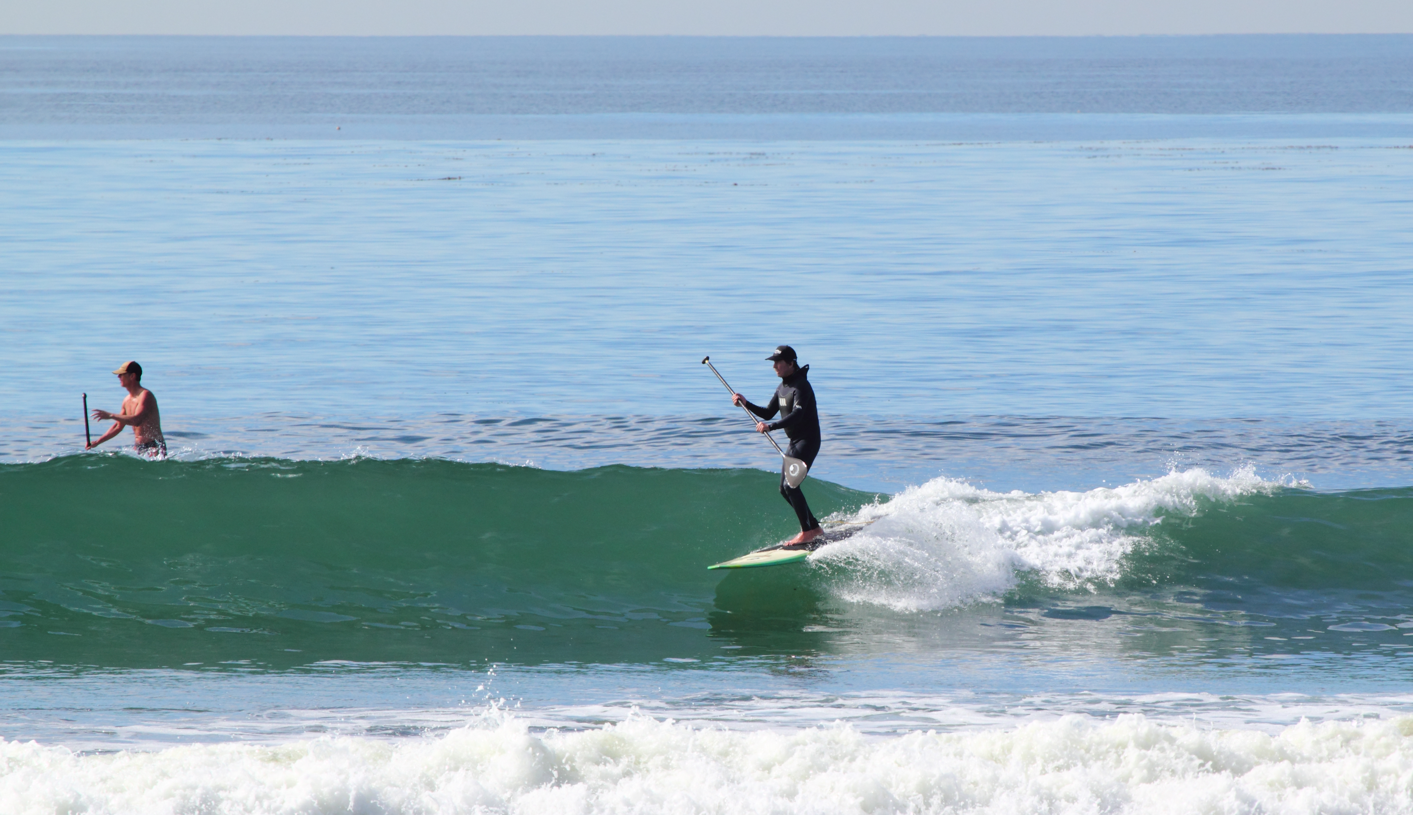 Stand-Up Paddle surfers at Cardiff Reef in Encinitas, California.