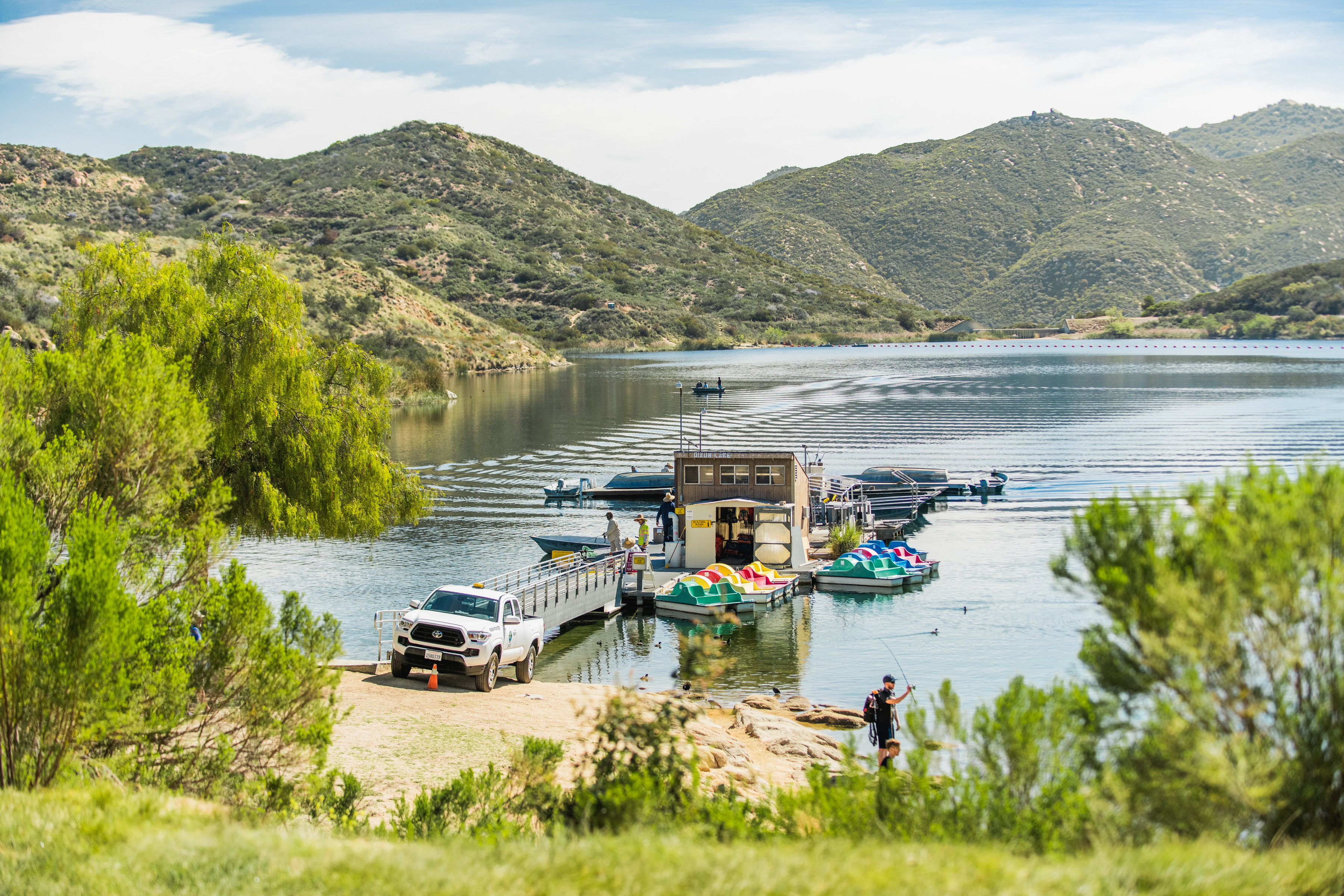 An afternoon view of boats at Dixon Lake in Escondido, California.