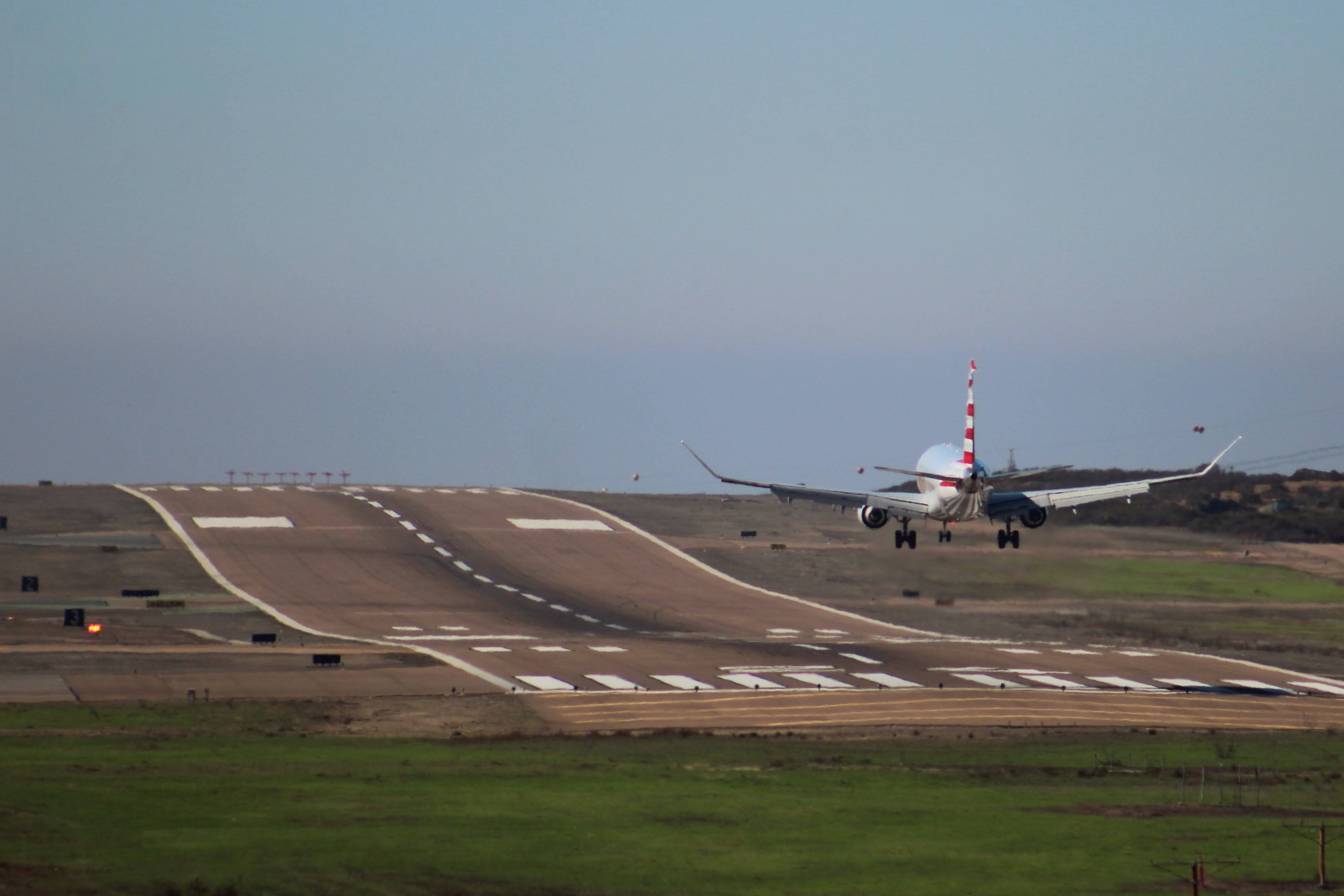 An Envoy Air Embraer E175 landing at McClellan-Palomar Airport in November 2025