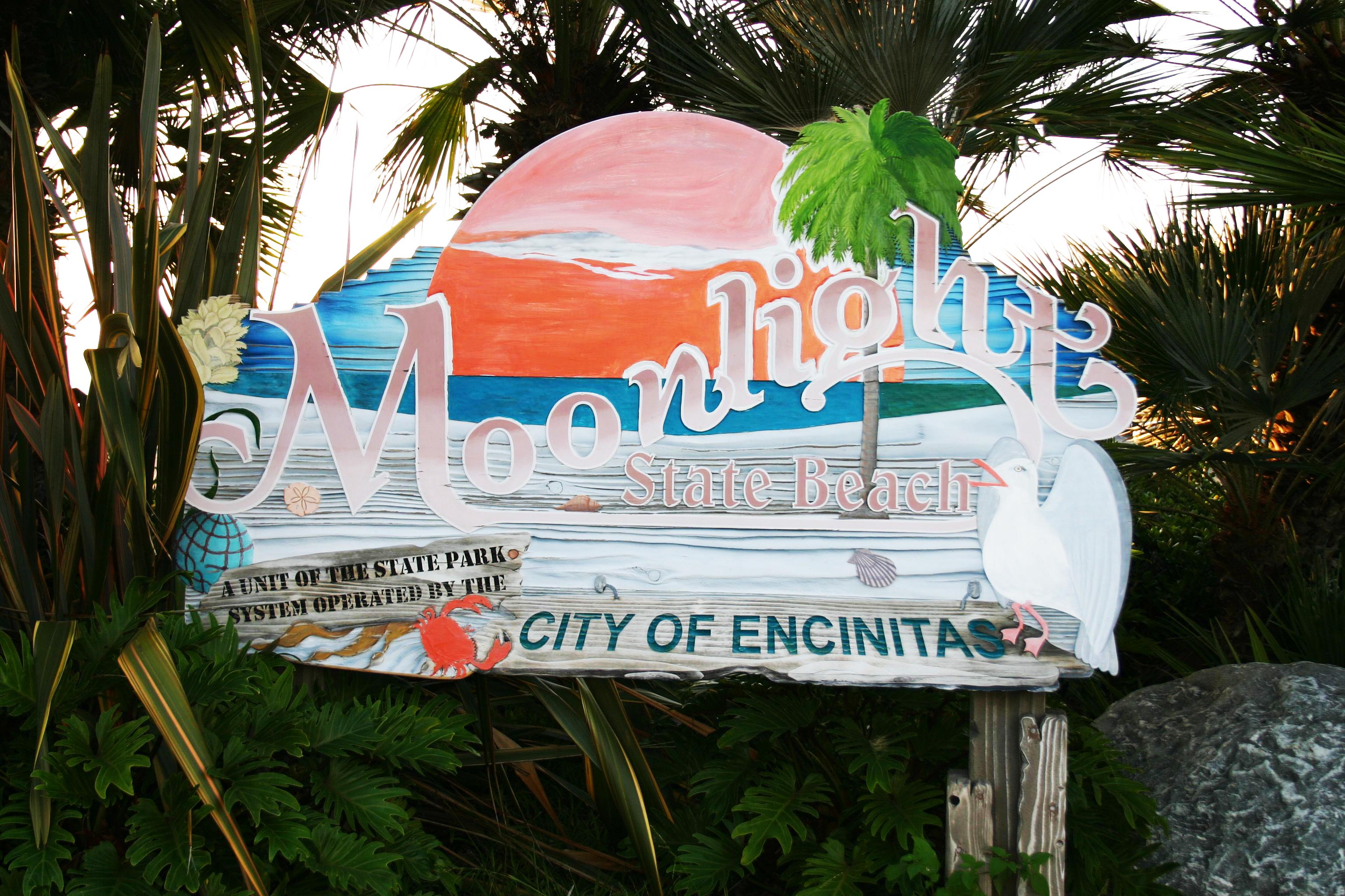 Signboard at south-east corner of upper car park at Moonlight Beach, Encinitas, California.