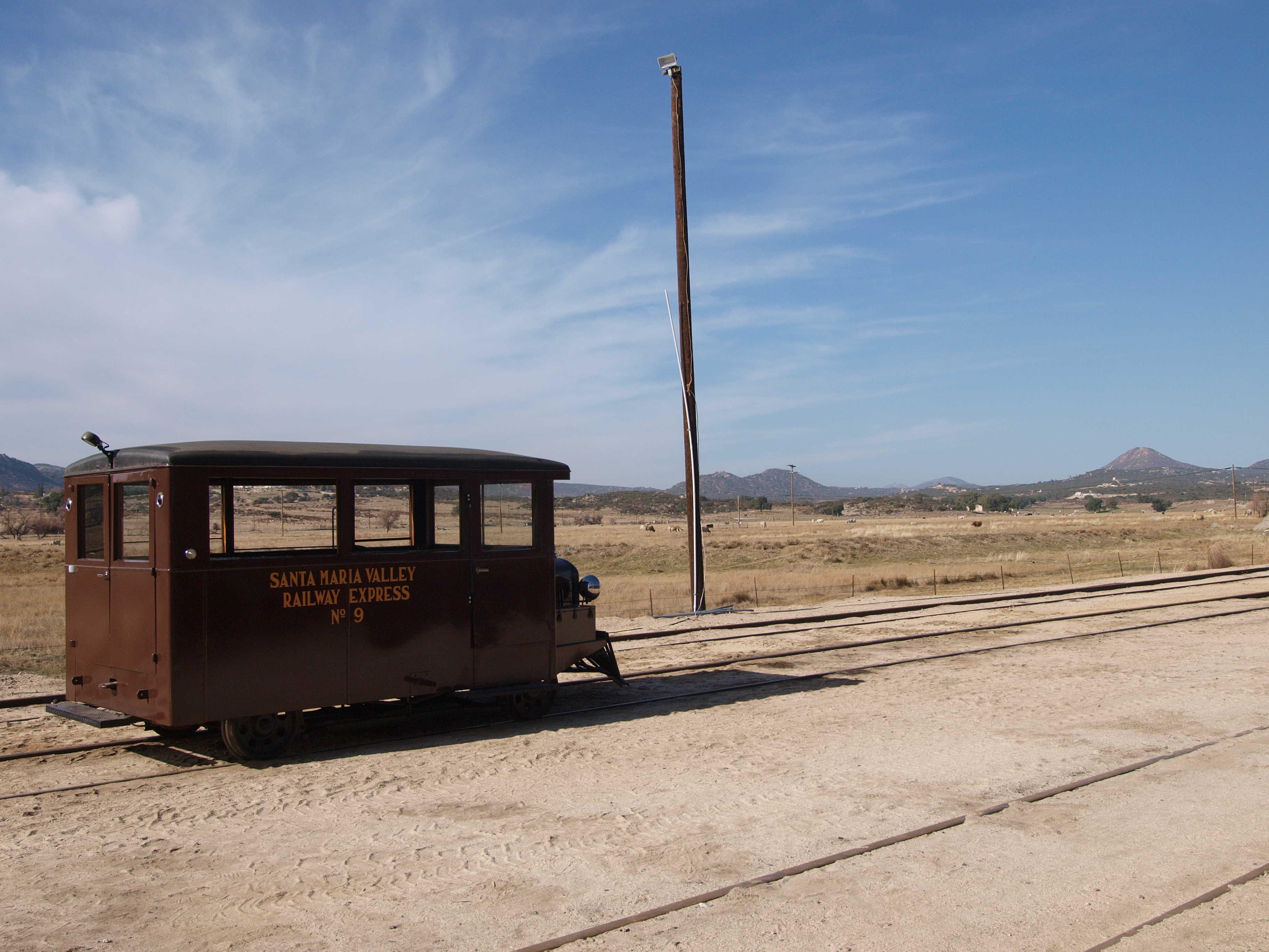 It's powered by a 3.3L Model A engine (L-head).

Pacific Southwest Railway Museum - Campo, California: Santa Maria Valley Flyer No. 9