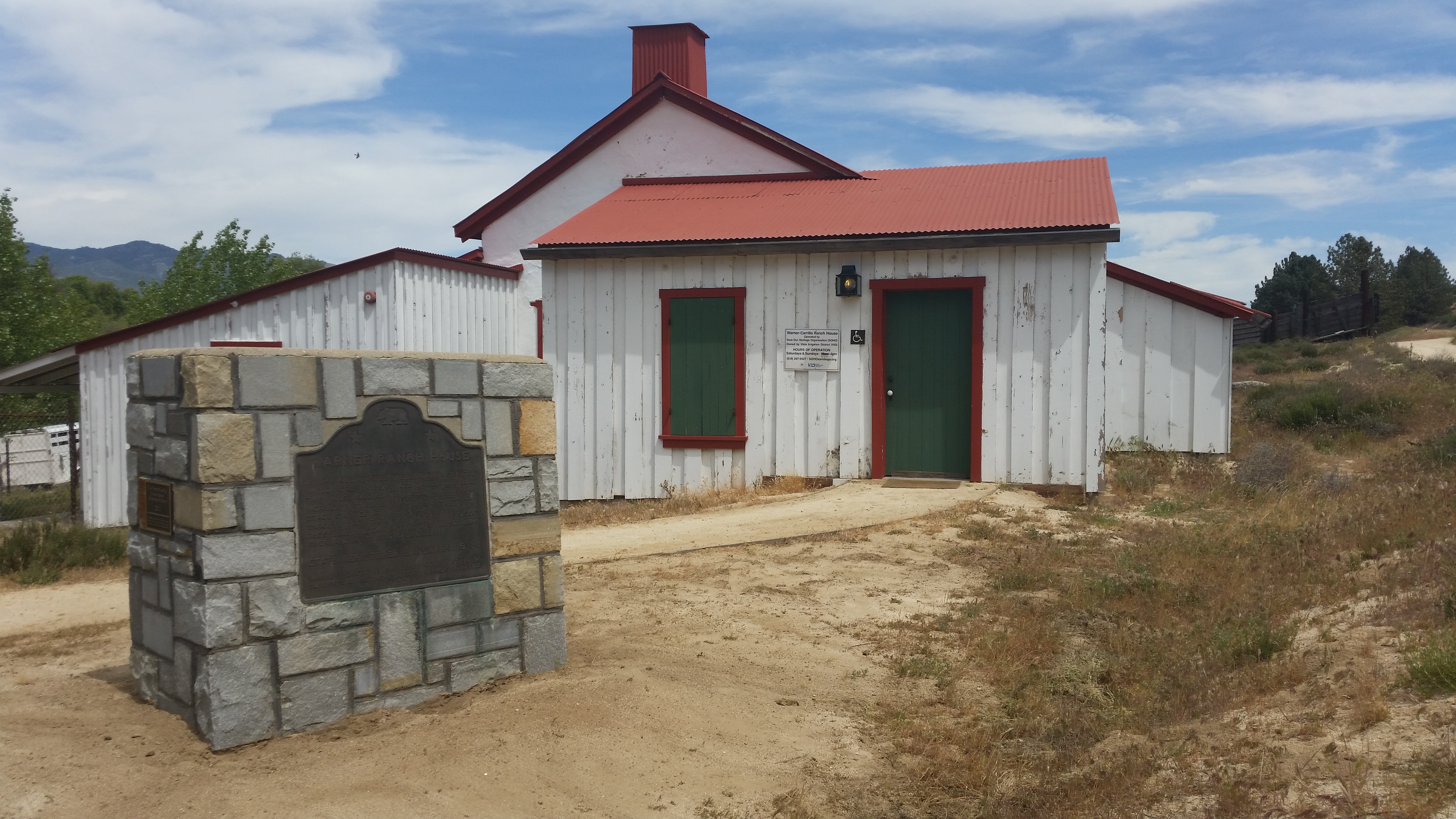 Historical marker and northwest side of the Carillo Adobe structure