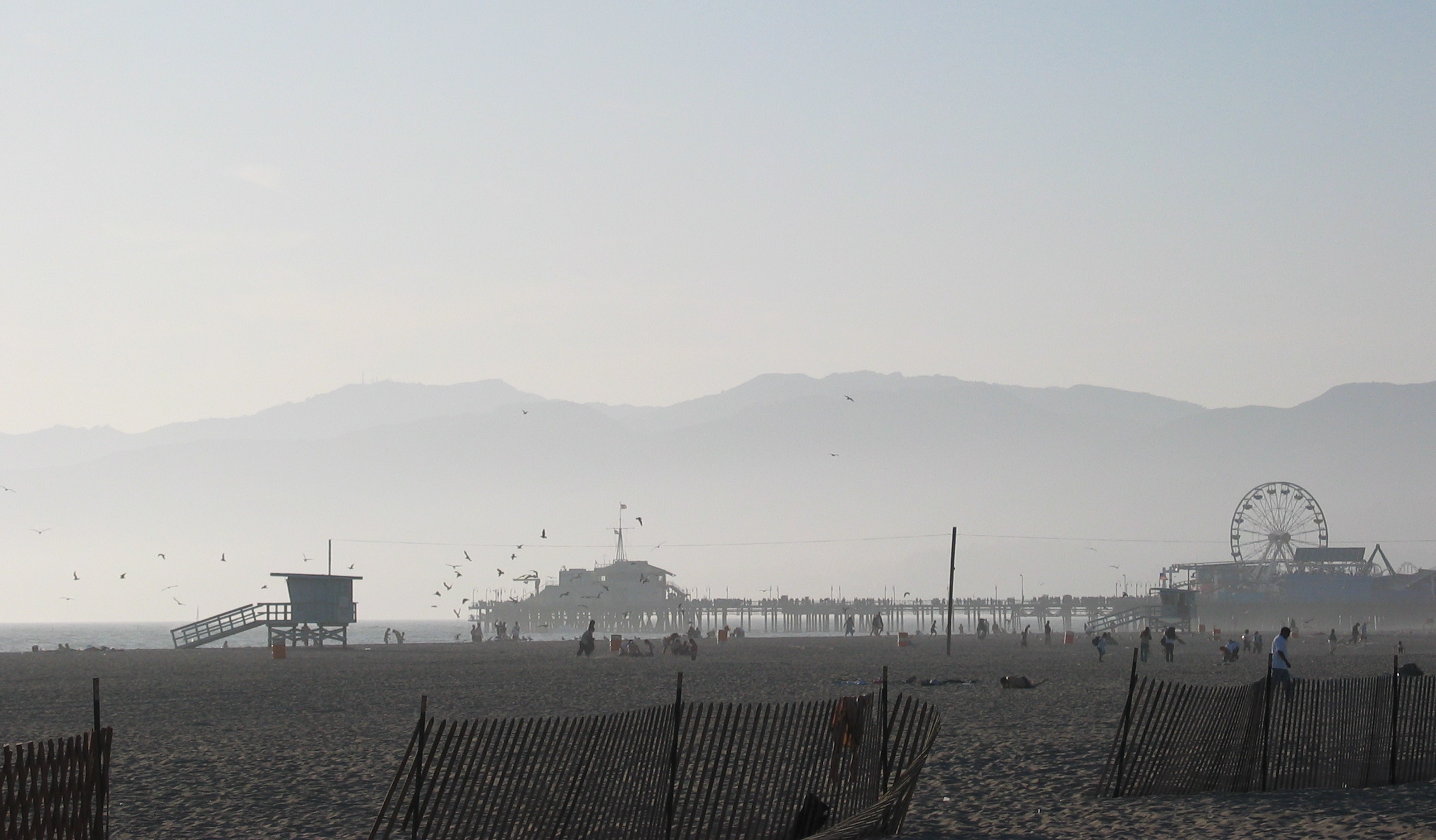 Santa Monica beach and pier, with Santa Monica Mountains in backround - Southern California, USA