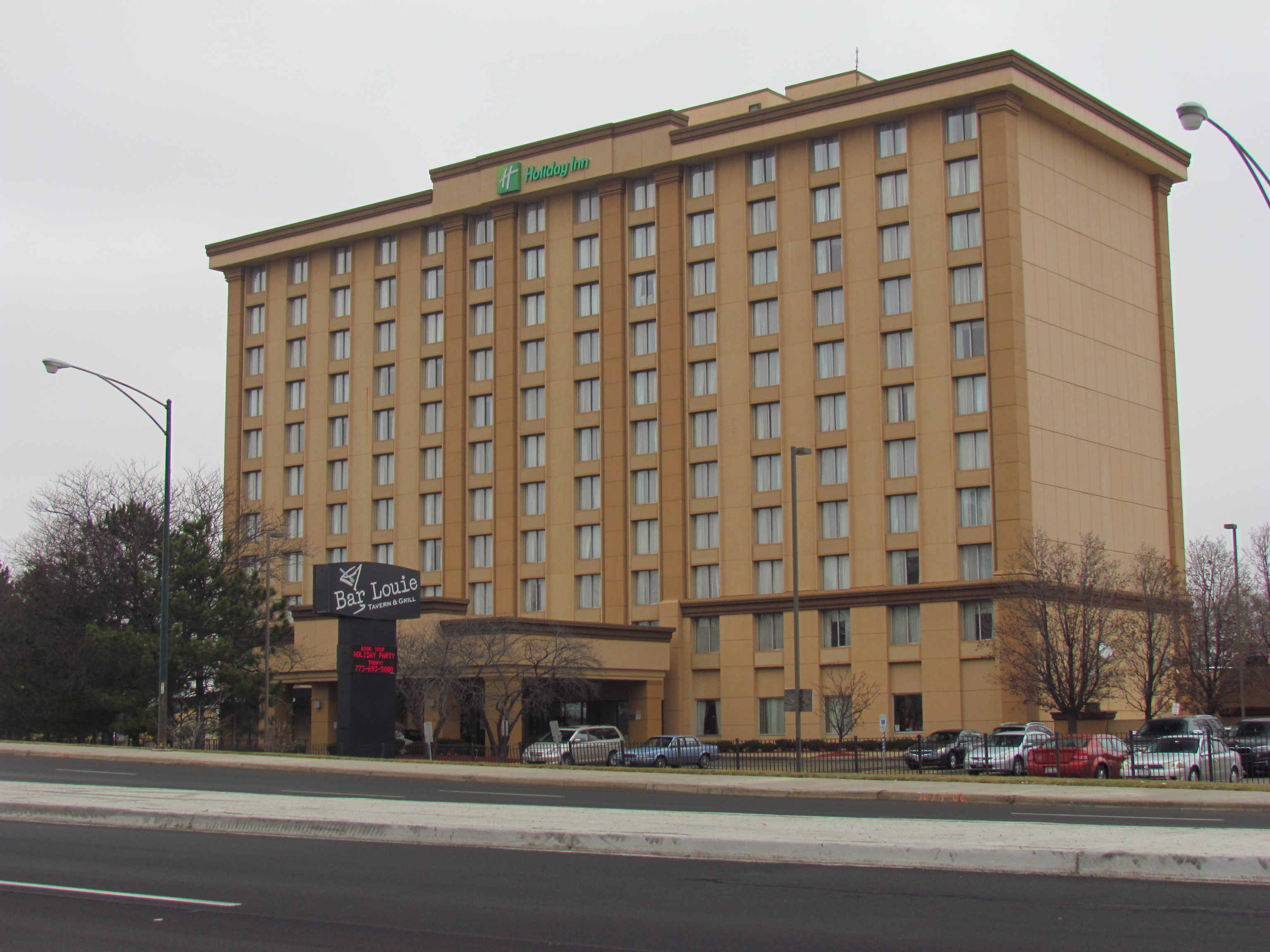 Former football star O. J. Simpson checked into the O'Hare Plaza Hotel on the morning of June 13, 1994. He received a phone call from the LAPD that, the night before, his ex-wife Nicole Brown Simpson and waiter Ronald Goldman had been murdered. He checked out shortly thereafter. Simpson's own blood was found in the room but he claimed he had cut his hand smashing a glass in rage upon hearing of the murder. For years afterward the hotel offered a tour of Room 915, the "O. J. Simpson Room." John Wayne Gacy, Jr., who committed his murders in his house not far from here, was executed a month earlier. Located at 5615 N. Cumberland Ave.