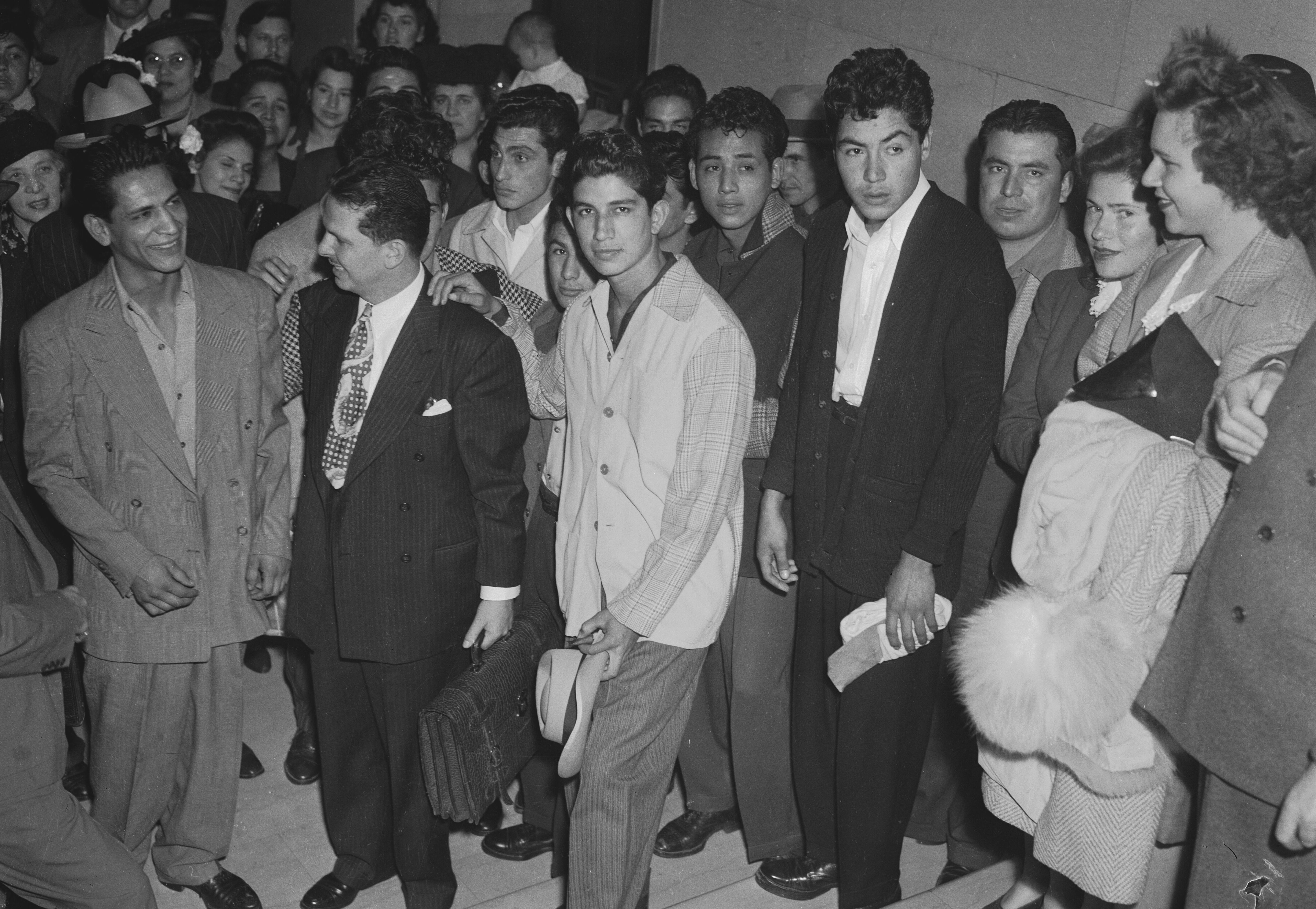Defendants in the Sleepy Lagoon murder trial are reunited with family and friends in the Los Angeles Hall of Justice following their acquittal., After the murder and assault convictions of 17 Mexican American youths in the Sleepy Lagoon murder case, the Sleepy Lagoon Defense Committee advocated for the defendants until the 9th Circuit Court of Appeals overturned the convictions as a miscarriage of justice.