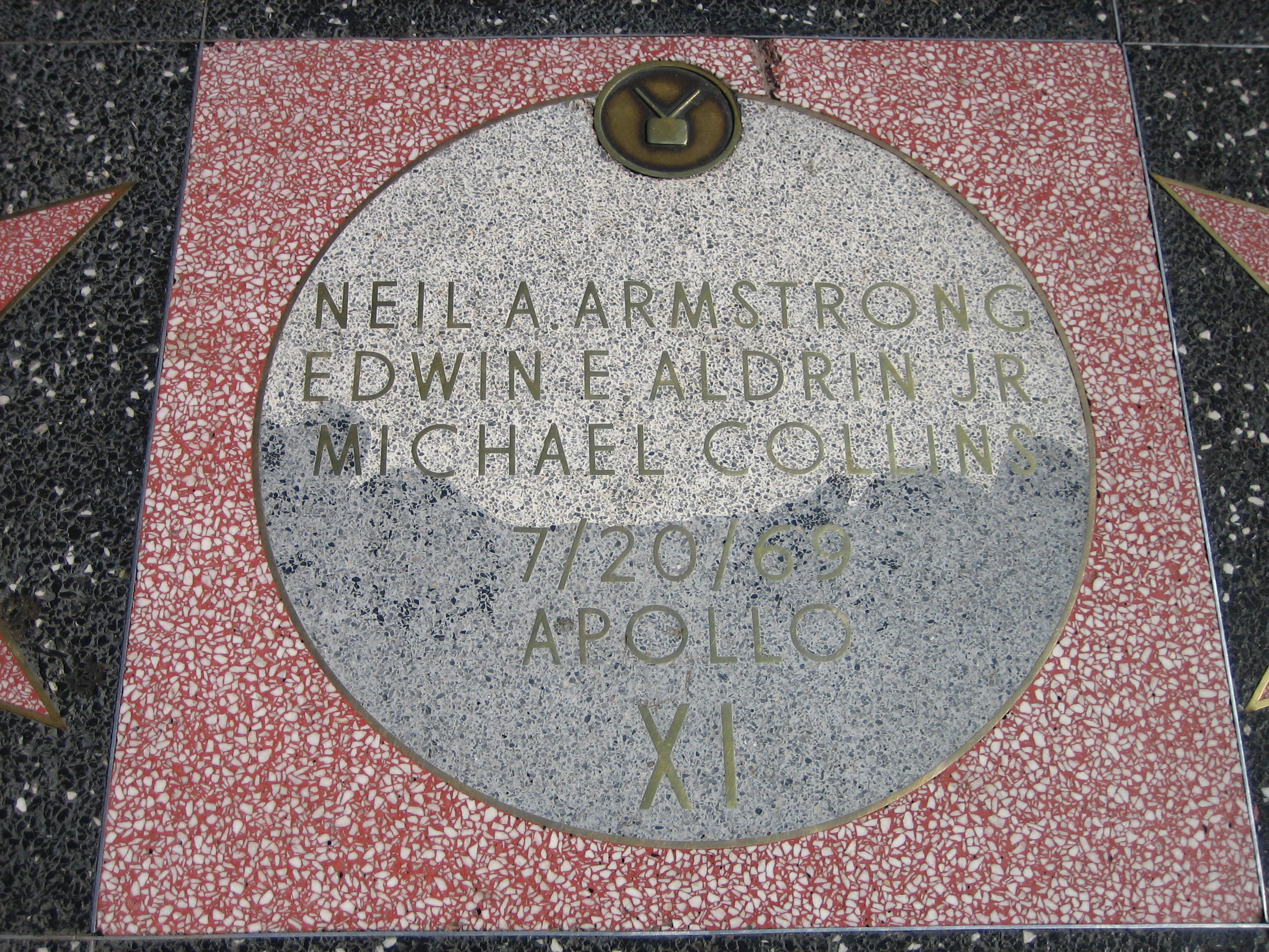 One of four identical moons honouring the crew of Apollo XI at the corner of Hollywood and Vine on the Hollywood Walk of Fame. (original description)