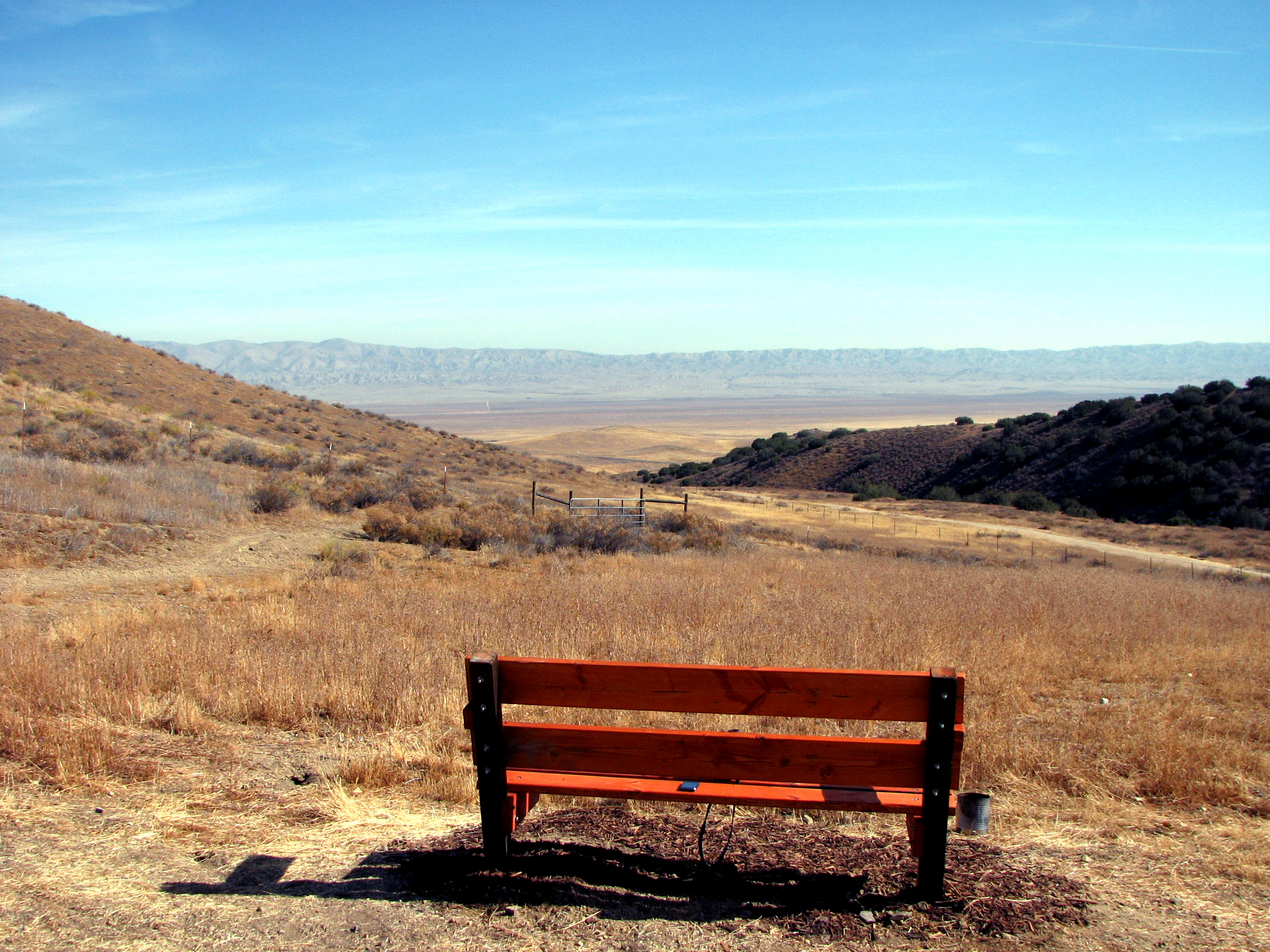 A Fall view of Carrizo Plain National Monument from the Selby Campground.
This bench is located at an elevation of 2,520 feet at the eastern edge of the campground.
Carrizo Plain is located in eastern San Luis Obispo County, central California.
Mano Seca Group
This bench with its view of the Carrizo Plain is another one installed by the Mano Seca Group and provided free of charge to the public so that they might enjoy the scenic western United States.
All Mano Seca benches are branded and trademarked.
Find all the other Mano Seca benches in the West!