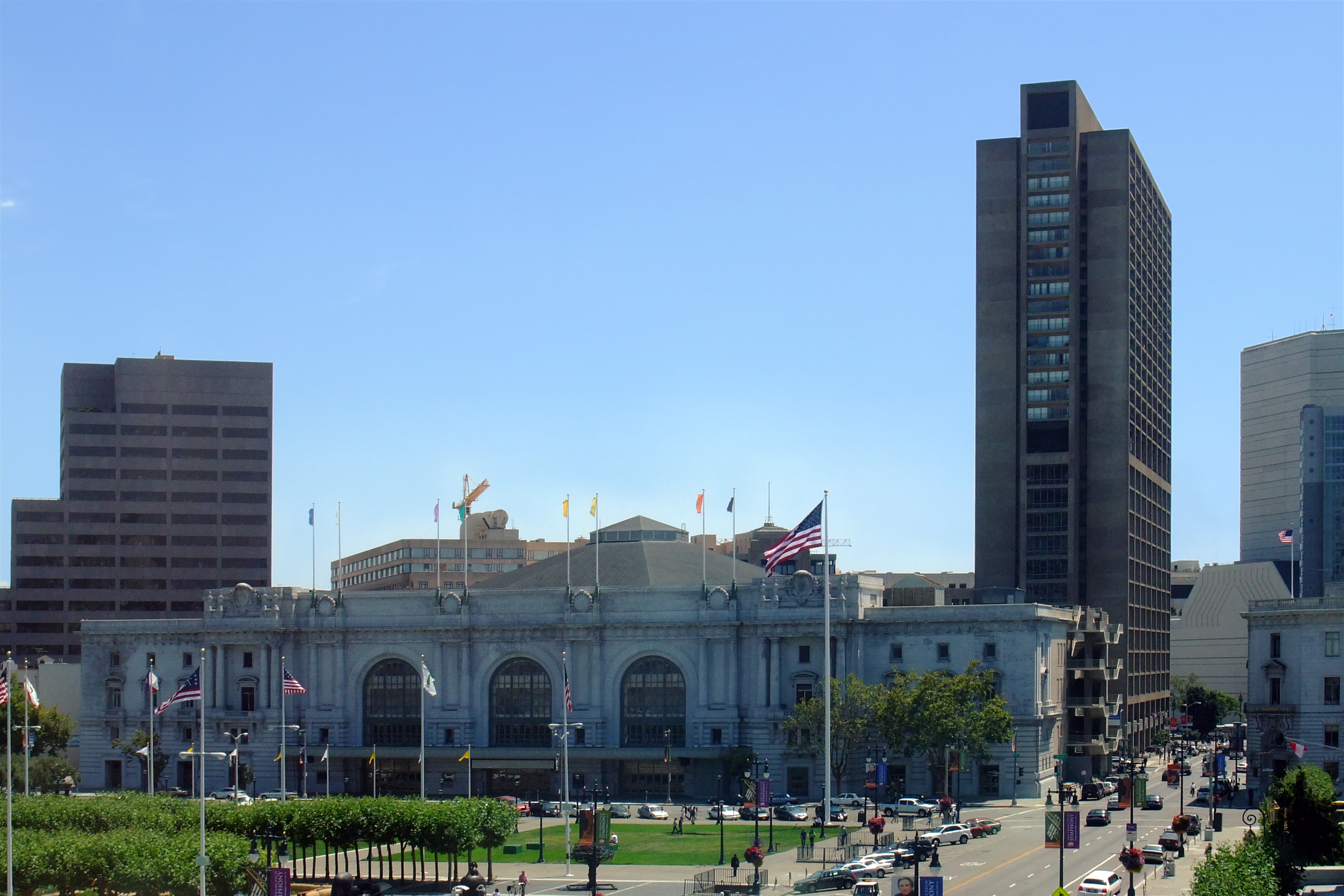 Bill Graham Civic Auditorium, with Fox Plaza in the back. 
Part of the San Francisco Civic Center.