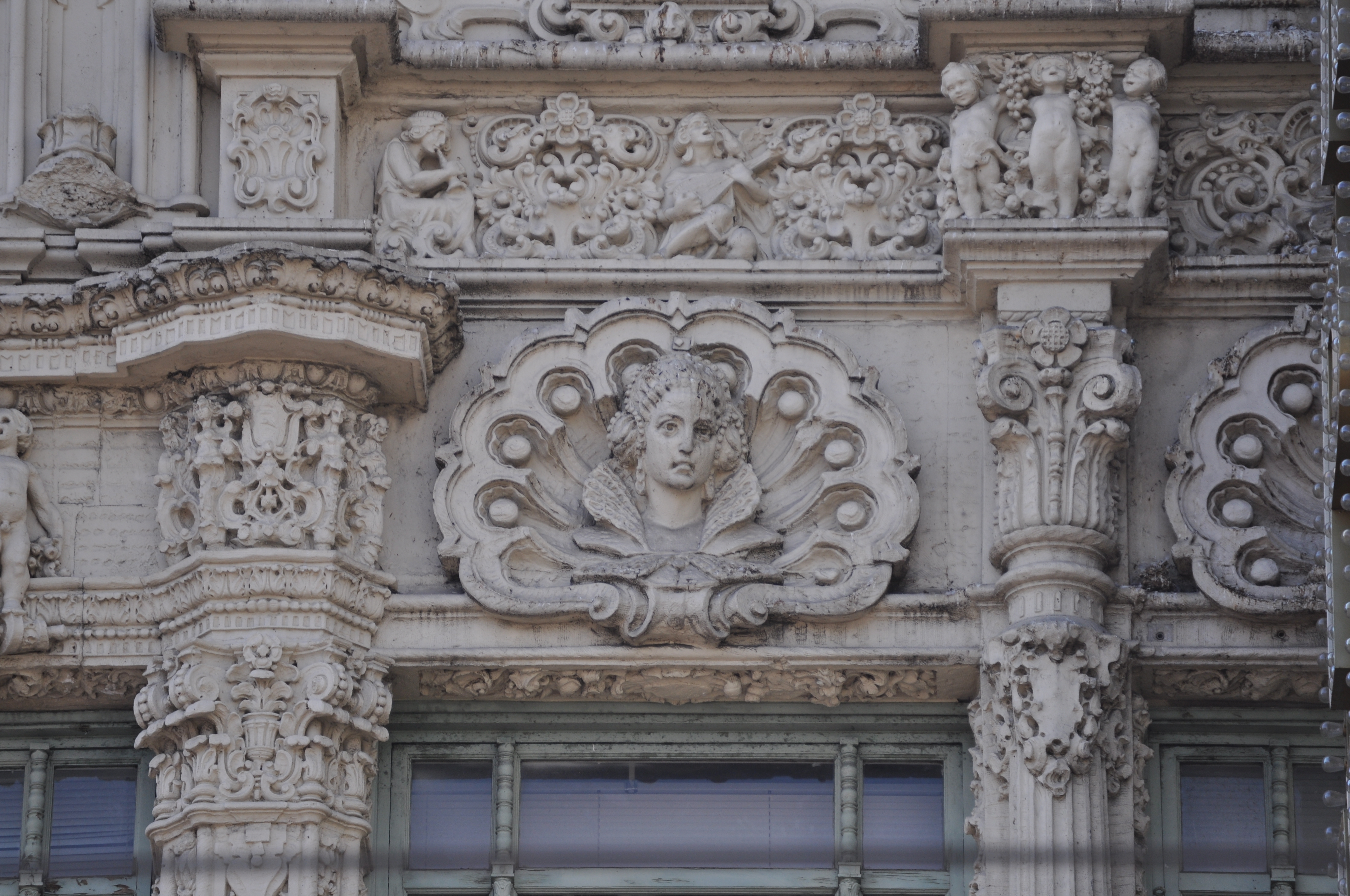 Terracotta relief of a woman over left side of marquee, Orpheum Theatre, 1192 Market Street, San Francisco, California, USA.