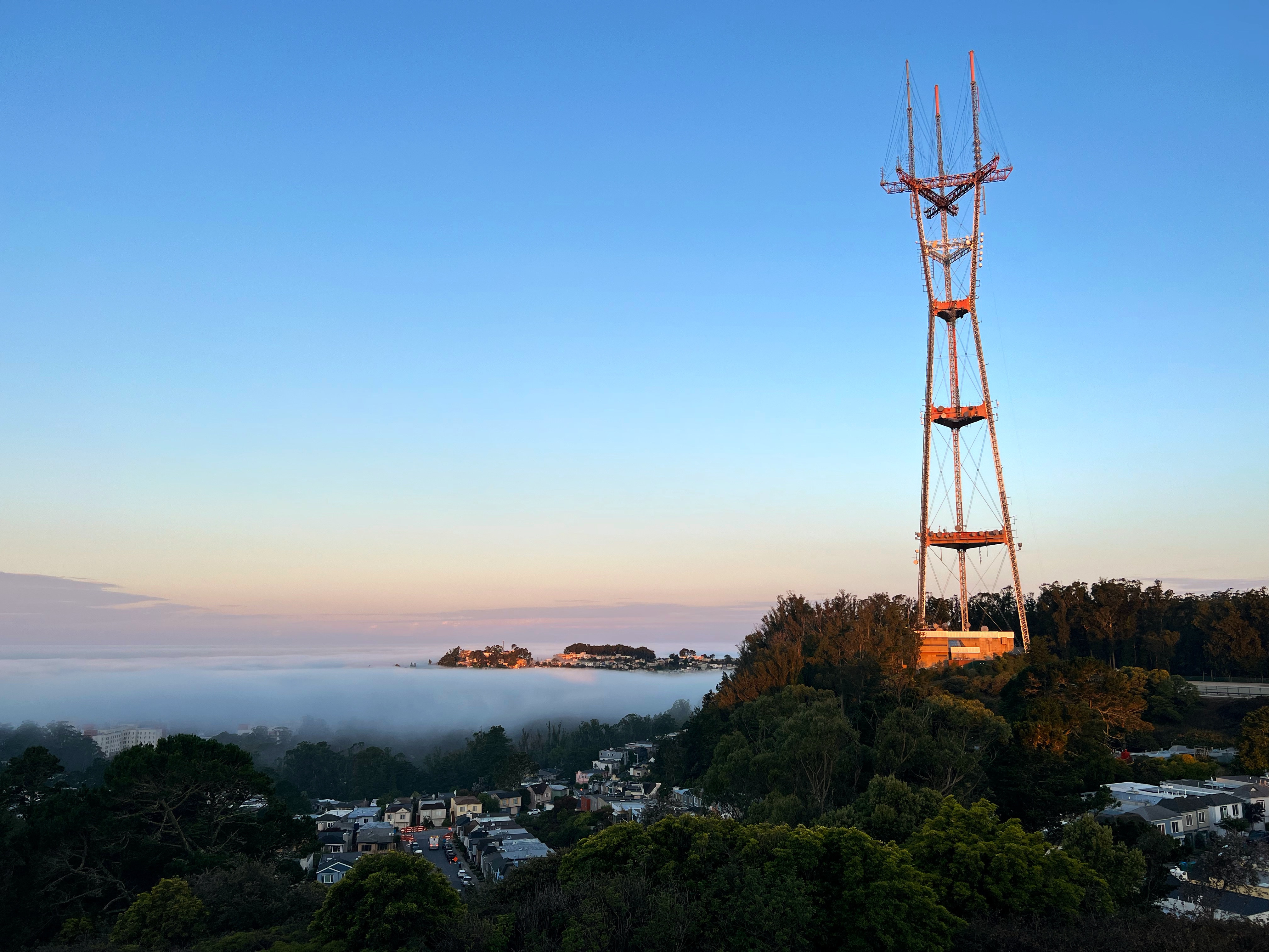 View of Sutro Tower from the top of Twin Peaks in San Francisco at sunrise