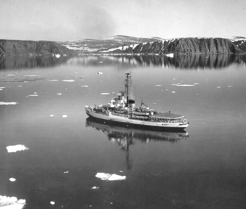 United States Coast Guard icebreaker USCGC Westwind (WAGB-281) approaching U.S.C.G. LORAN Station Cape Atholl, Greenland (1964).
Source
United States Coast Guard: Ice Breakers - A Historic Photo Gallery