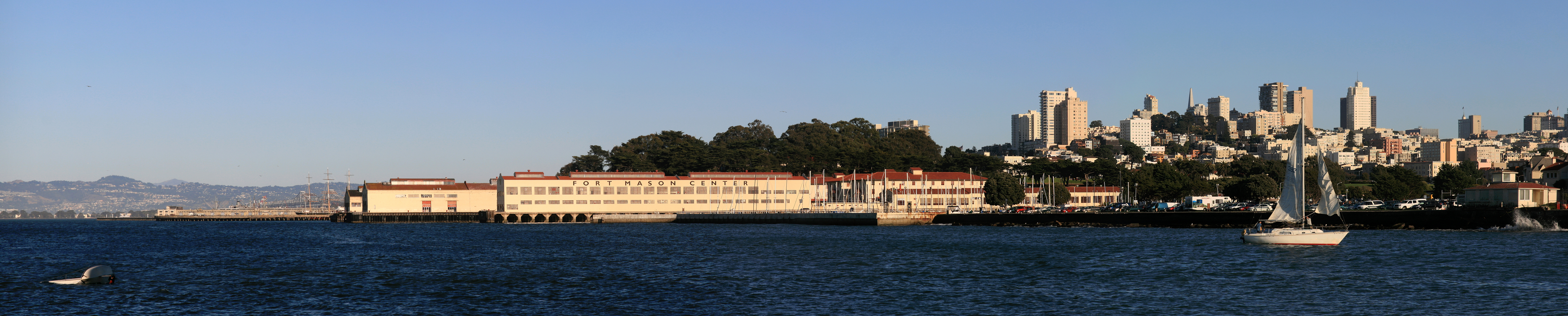 w:Fort Mason Center and Downtown San Francisco. Fort Mason, also known as San Francisco Port of Embarkation, US Army, in w:San Francisco, w:California is a former w:United States Army post located in the northern Marina District, alongside San Francisco Bay. Fort Mason served as an Army post for more than 100 years, initially as a coastal defense site. During w:World War II, it handled most of the cargo for the Pacific campaign. Fort Mason can be split into two distinct areas. This image is of the Fort Mason Center