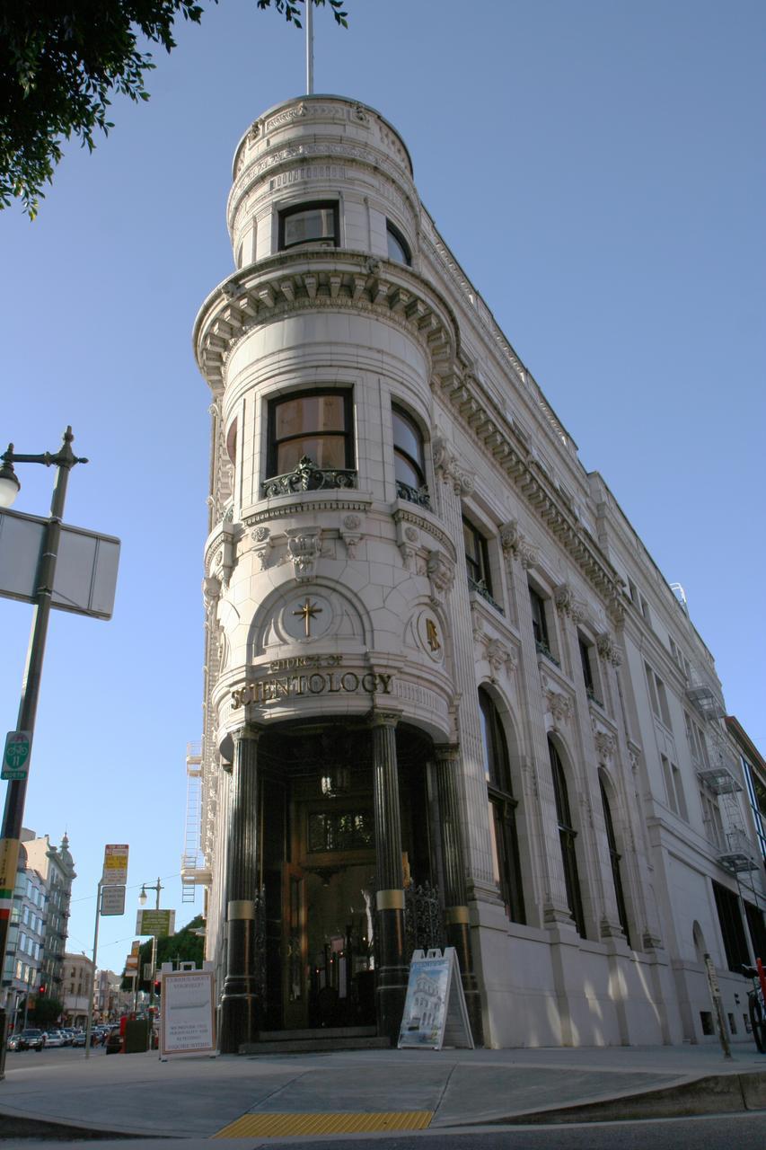 This triangular building was the Transamerica building before the much larger and more famous one was built nearby.  It is currently occupied by the Church of Scientology.