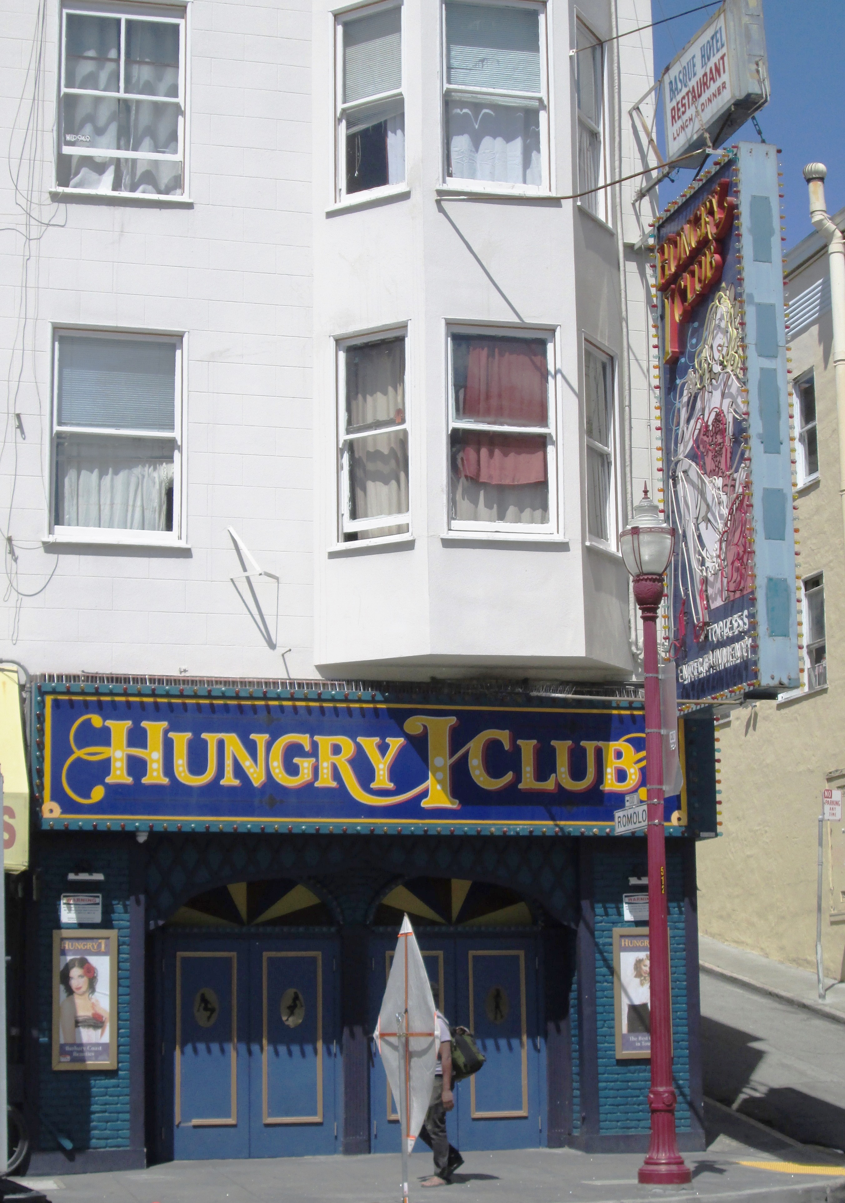 The hungry i nightclub, located at 546 Broadway at the corner of Romolo Place in the North Beach neighborhood of San Francisco, opened in 1950. In its heyday it featured comedy and folk and other music, with acts such as Maya Angelou (as a Caribbean singer, early in her career), Woody Allen, Malcolm Boyd, Lenny Bruce, Godfrey Cambridge, Dick Cavett, Professor Irwin Corey, Bill Cosby, the Gateway Singers, Vince Guaraldi, The Kingston Trio, Tom Lehrer, The Limeliters, John Phillips (of the Mamas &amp; the Papas, who led the house band, The Journeymen), Mort Sahl, Ronnie Schell, Barbara Streisand, Jackie Vernon, We Five, Jonathan Winters, and Glenn Yarborough, among others.The club moved to Ghiradelli Square in 1967, where it was primarily a rock venue; it closed there in 1970.  The current club on Broadway is a strip club.