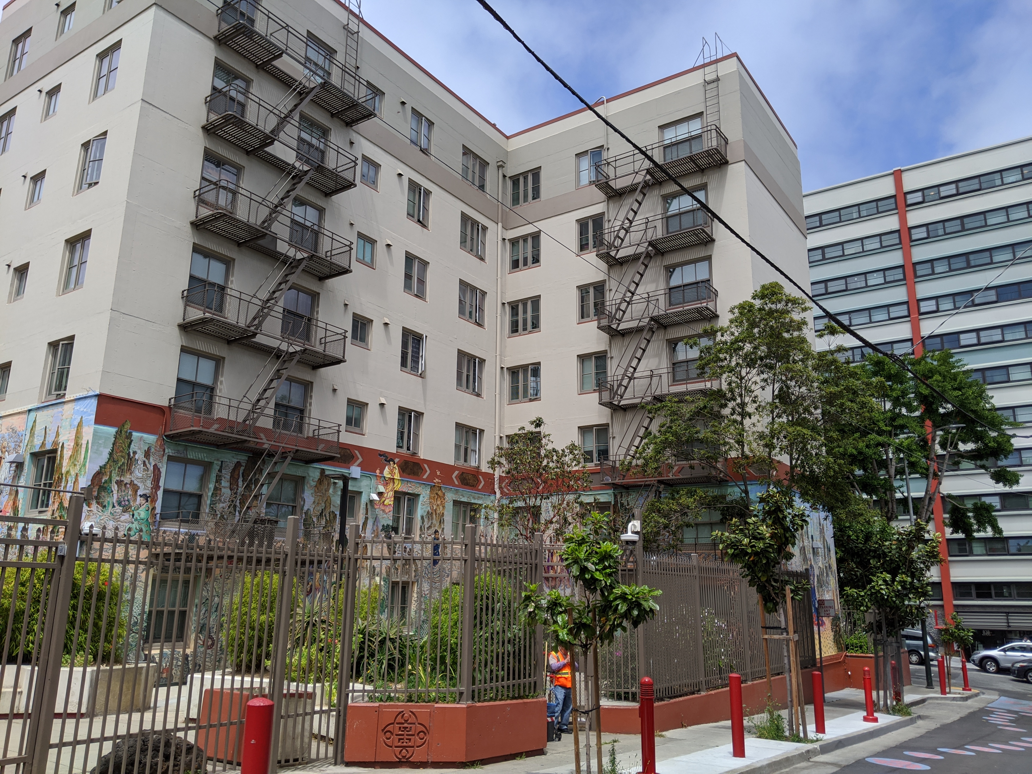 The West Ping Yuen (西平園, left) and North Ping Yuen (北平園, in the background on the right) buildings of the Ping Yuen public housing complex in San Francisco's Chinatown, seen from Trenton Street