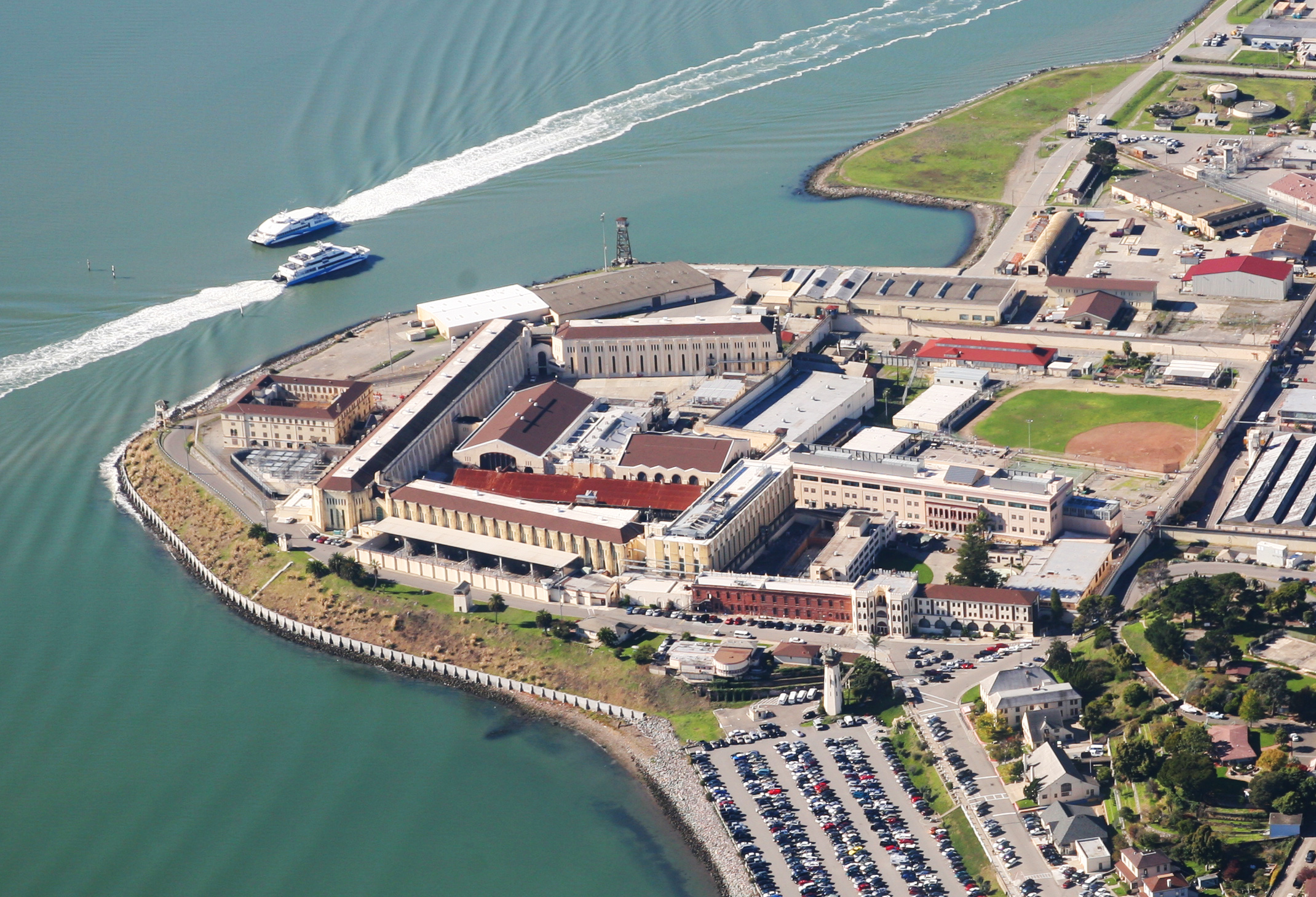 Across the bay from San Francisco, not quite as famous as Alcatraz which is on an island between here and the city.

The two boats passing each other just off-shore are passenger ferries that take commuters between Larkspur and downtown San Francisco