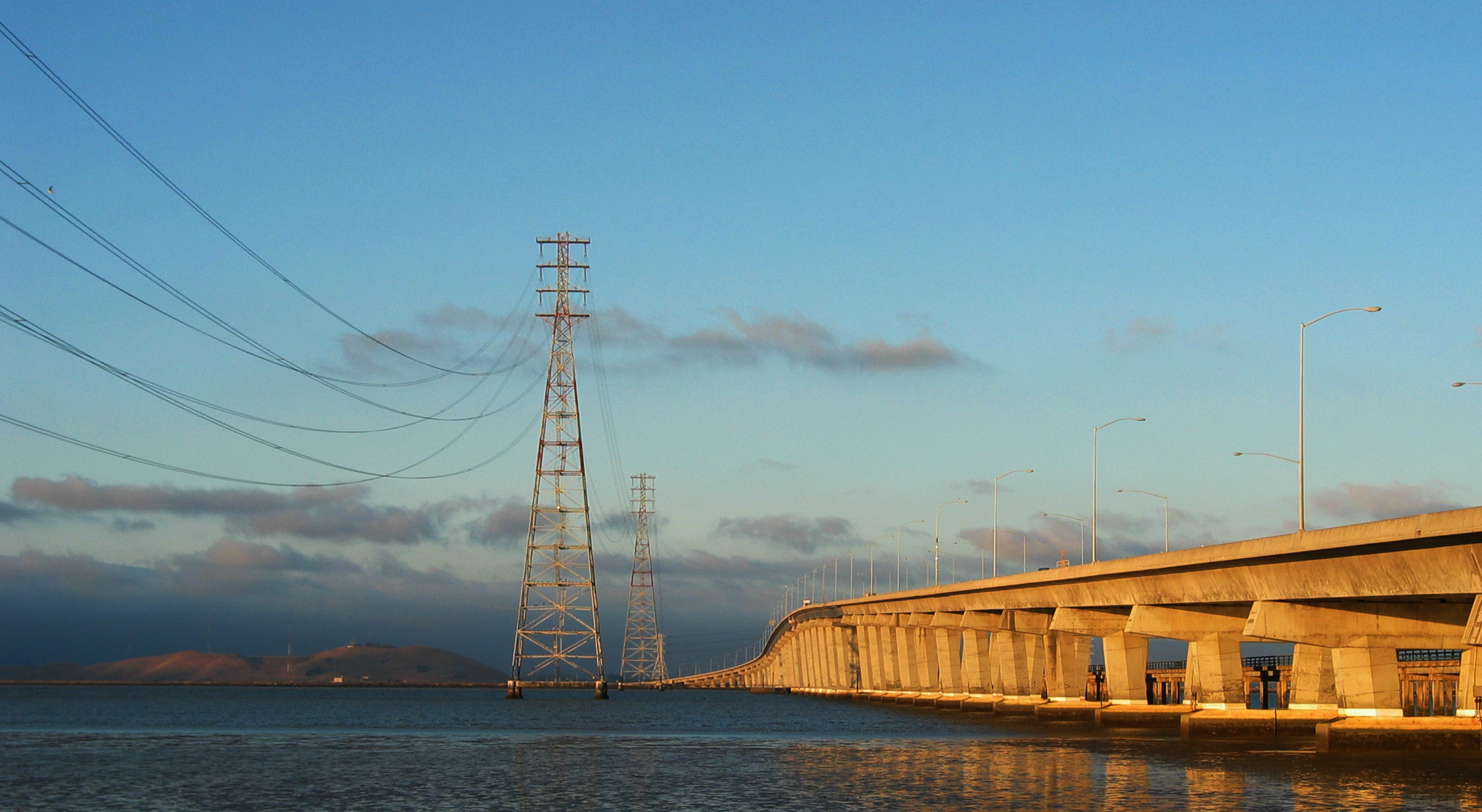 The power towers and the Dumbarton Bridge at sundown. Photo is taken from the north side of the bridge, looking east.