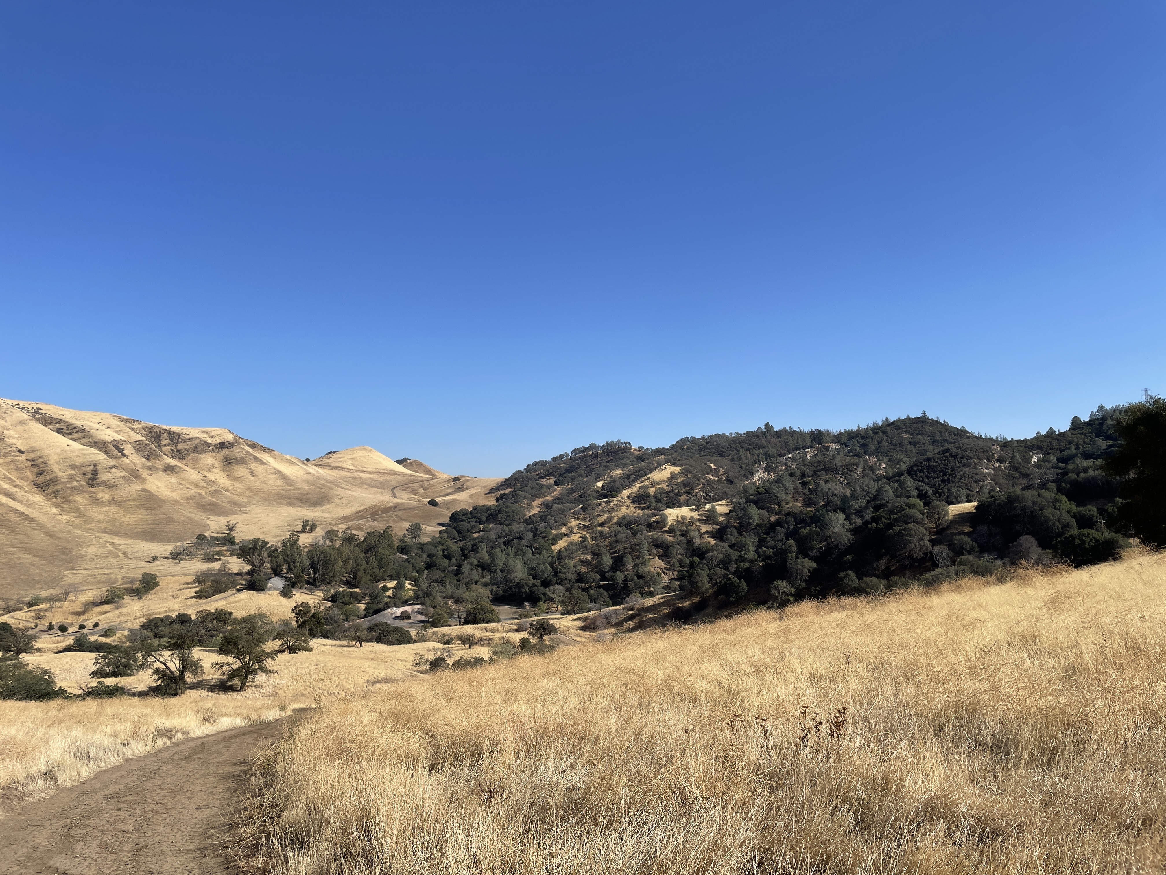 This is a panoramic photo taken just below the Rose Hill Cemetery. The Greathouse Portal to the Hazel-Atlas Mine is in the distance.