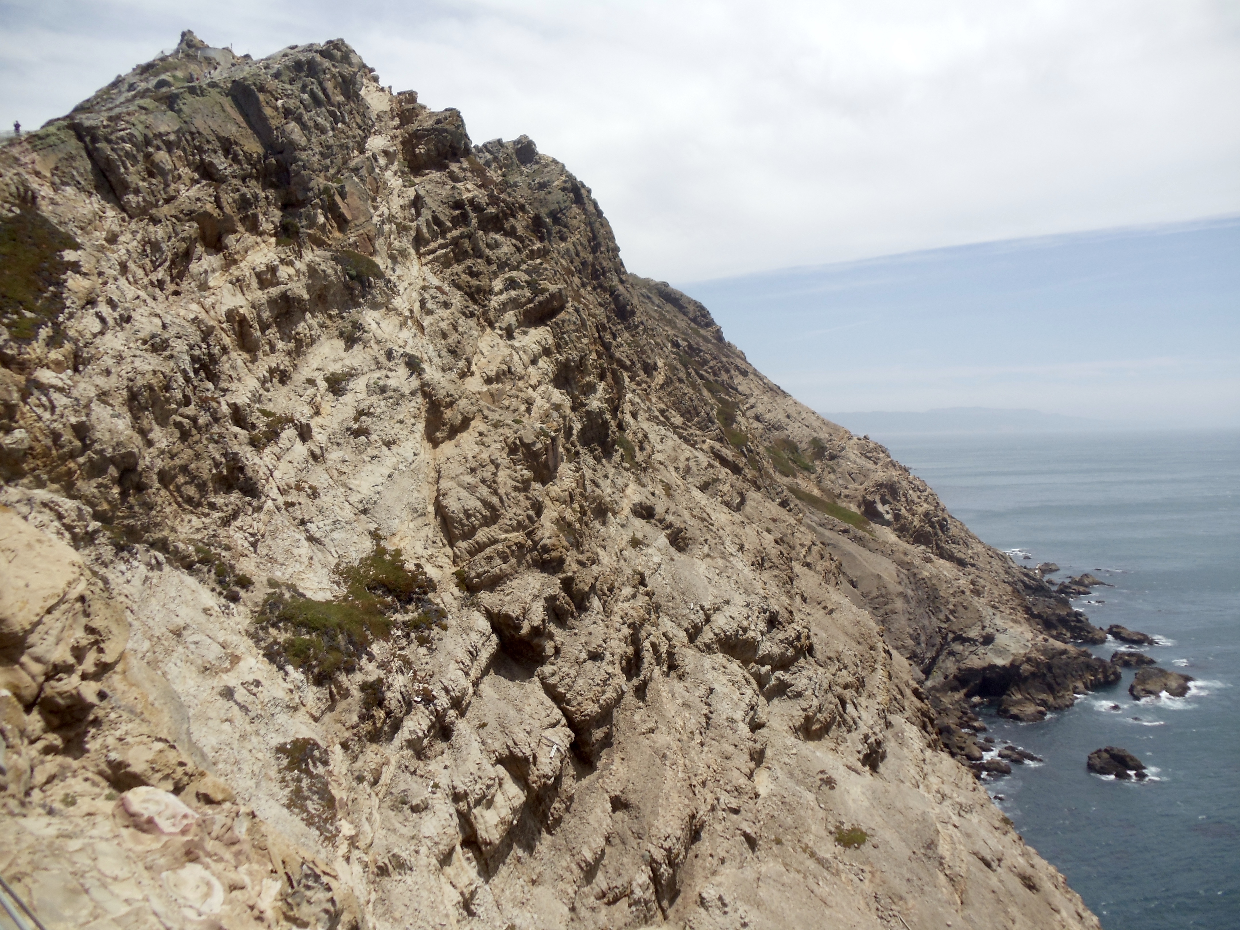 The upward-sloping Salinian Block formation that spans the entirety of California's central coast can prominently be seen here from the Point Reyes Lighthouse.