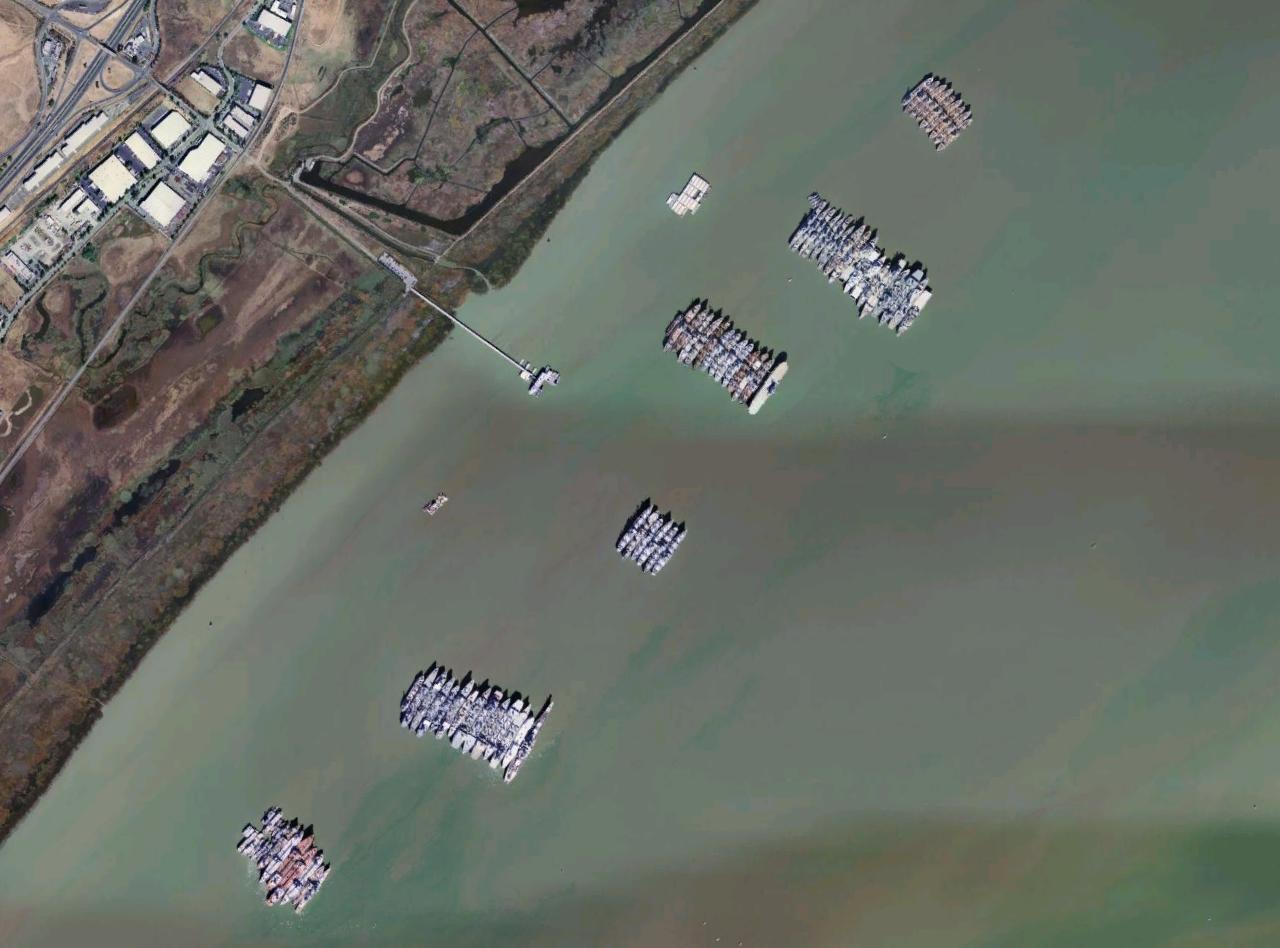 USGS aerial photo montage of "nests" of anchored USNR ships at the National Defense Reserve Fleet in Suisun Bay, California.