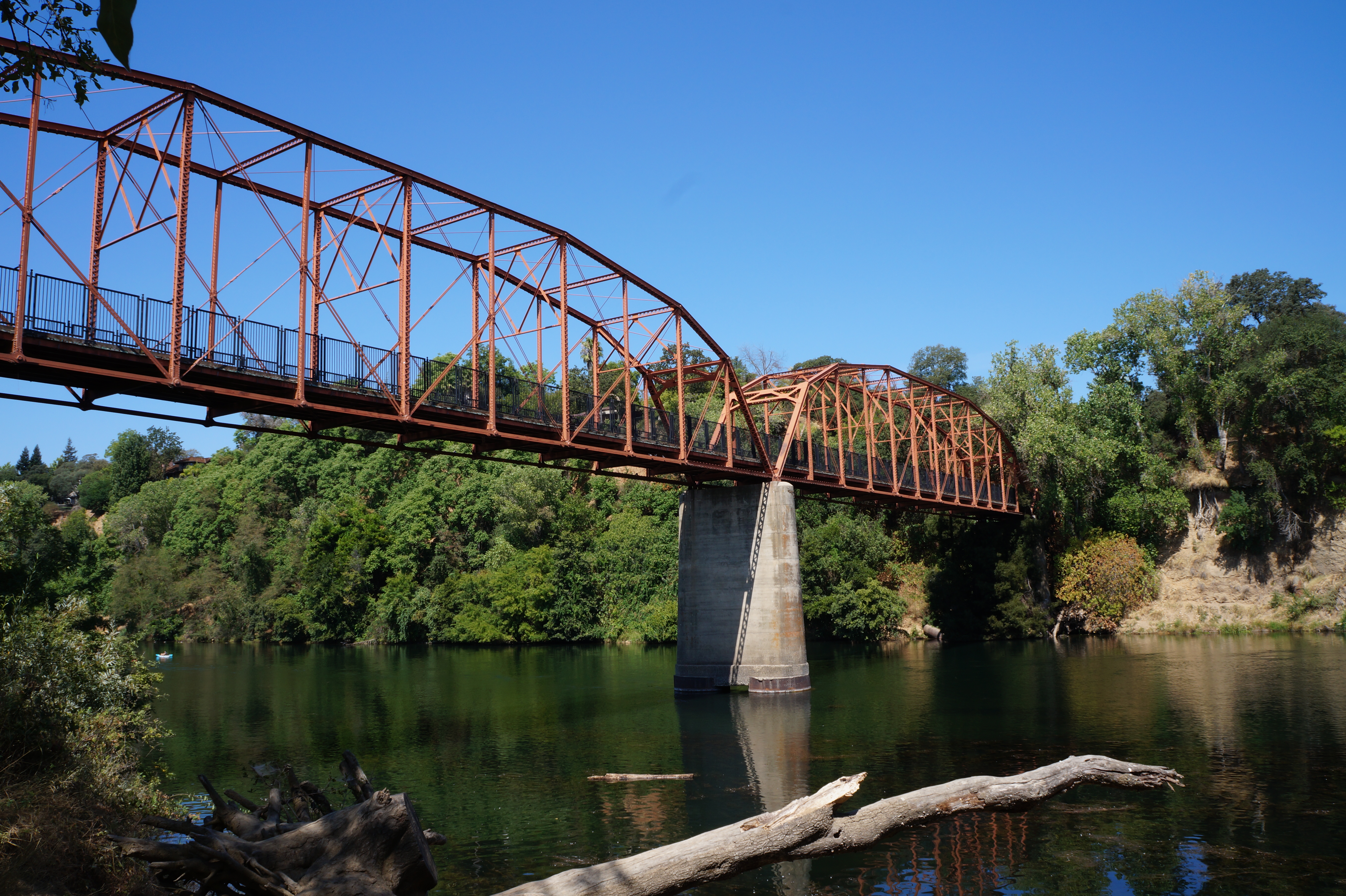 Photograph of the Fair Oaks Bridge from the southern bank of the American River.
