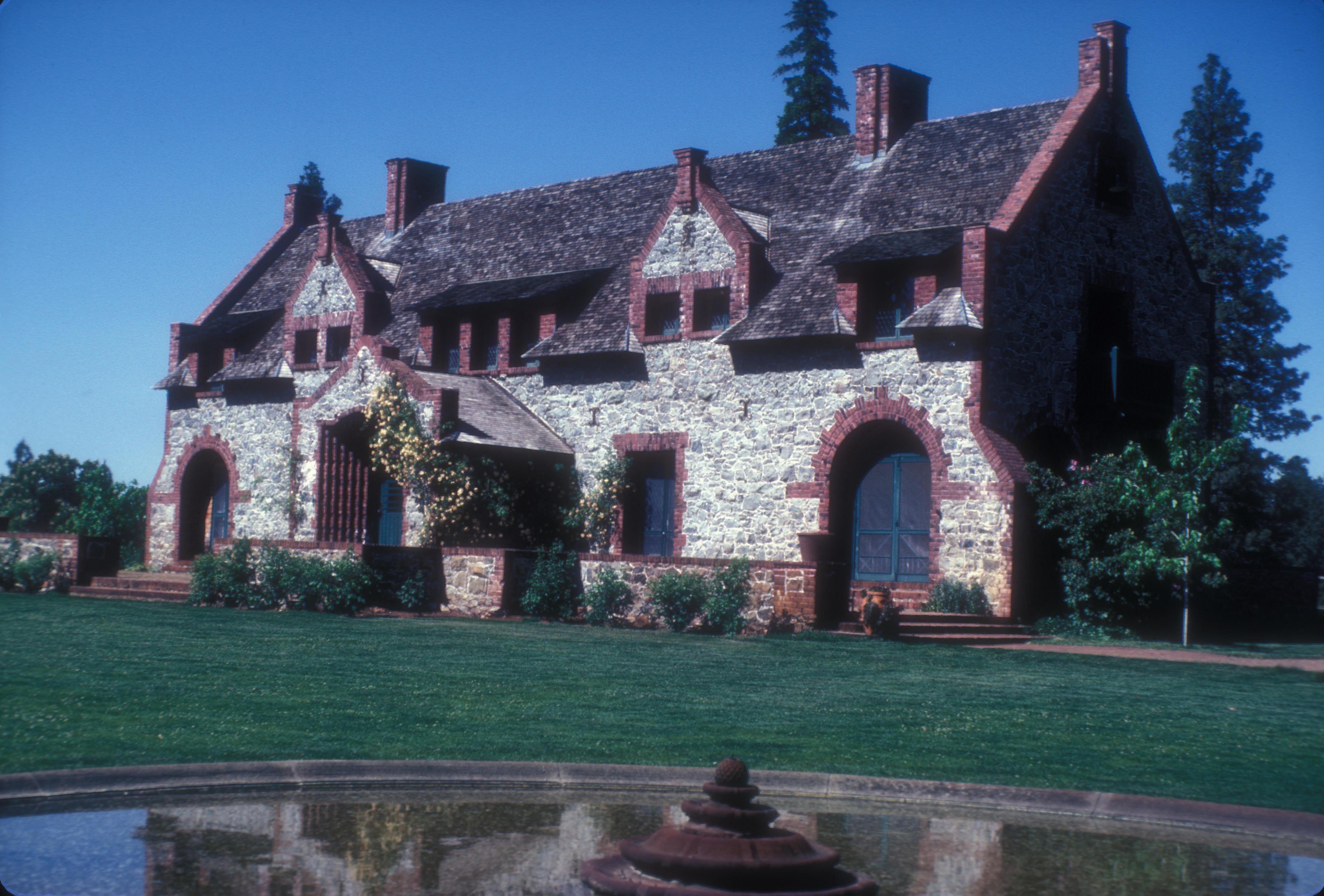 EMPIRE COTTAGE — stone mansion at the Empire Mine, Empire Mine State Historic Park, in Grass Valley, California.
BUILT in the ENGLISH COUNTRY HOME style, and called a COTTAGE to DISTINGUISH it from MR. BOURN'S other SUMMER HOMES and MANSIONS (such as 'Filoli' in Woodside) in the SAN FRANCISCO Bay Area.
May show CORNISH design influences, since virtually most the miners at the Empire Mine were from the tin and copper mines of Cornwall, England with experience and expertise in hard rock mining.