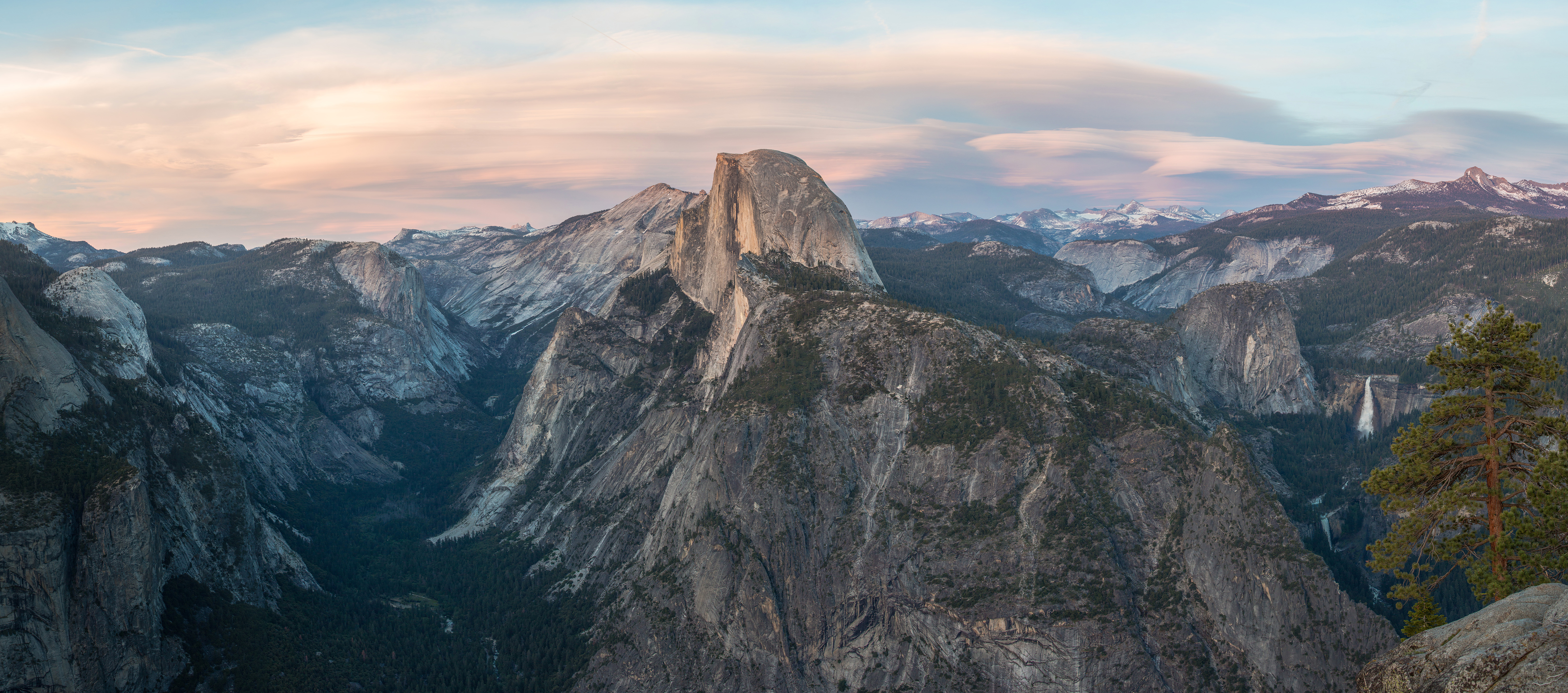 A panoramic view from Glacier Point in Yosemite National Park in California, United States. The view extends from roughly north (on the left side to east (on the right).