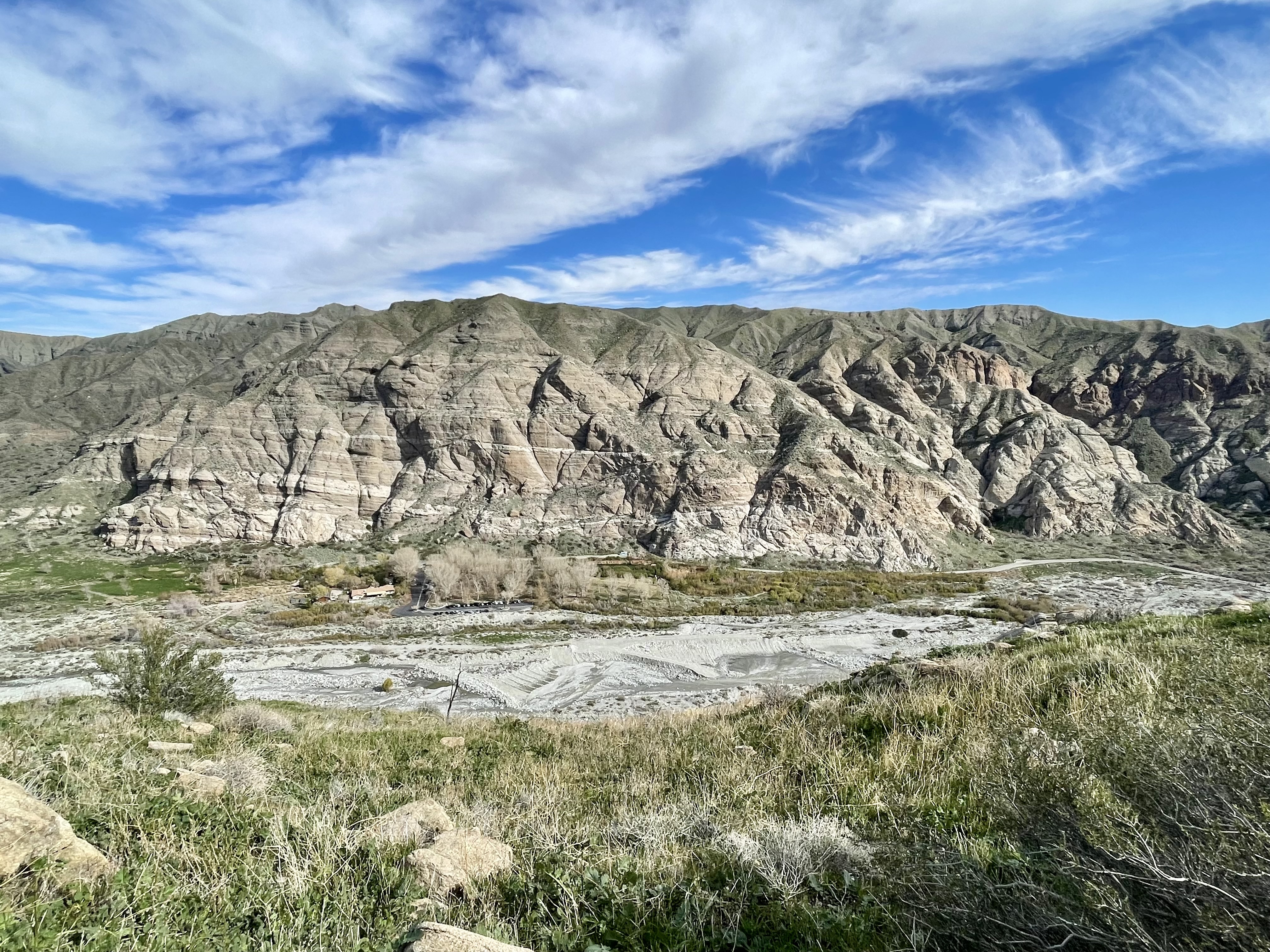 View of Whitewater Canyon at The Wildlands Conservancy’s Whitewater Preserve, Riverside County, California. The scene shows the broad wash with surrounding cliffs in the San Bernardino Mountains.