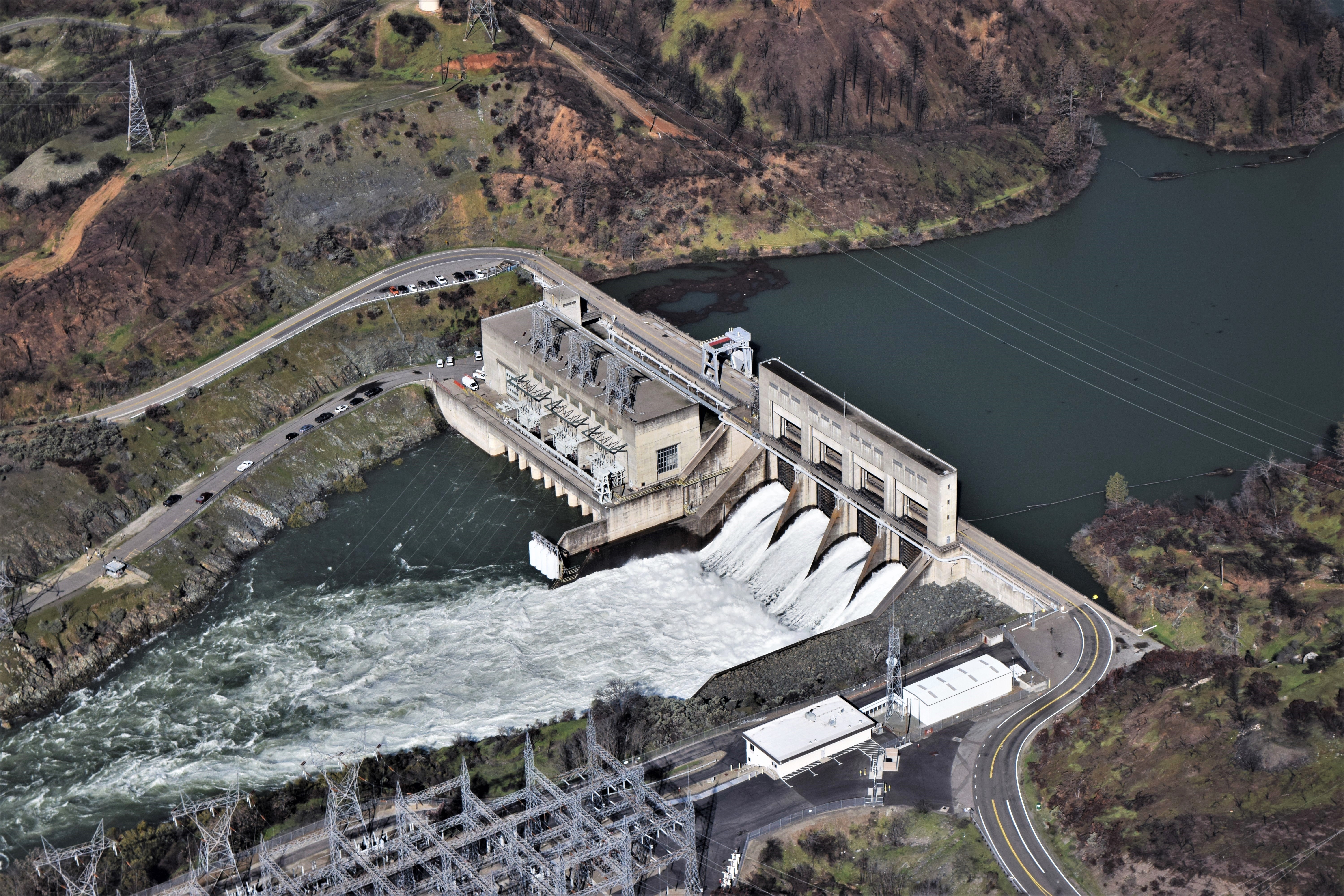 Photograph of an aerial view of Keswick Dam water release.