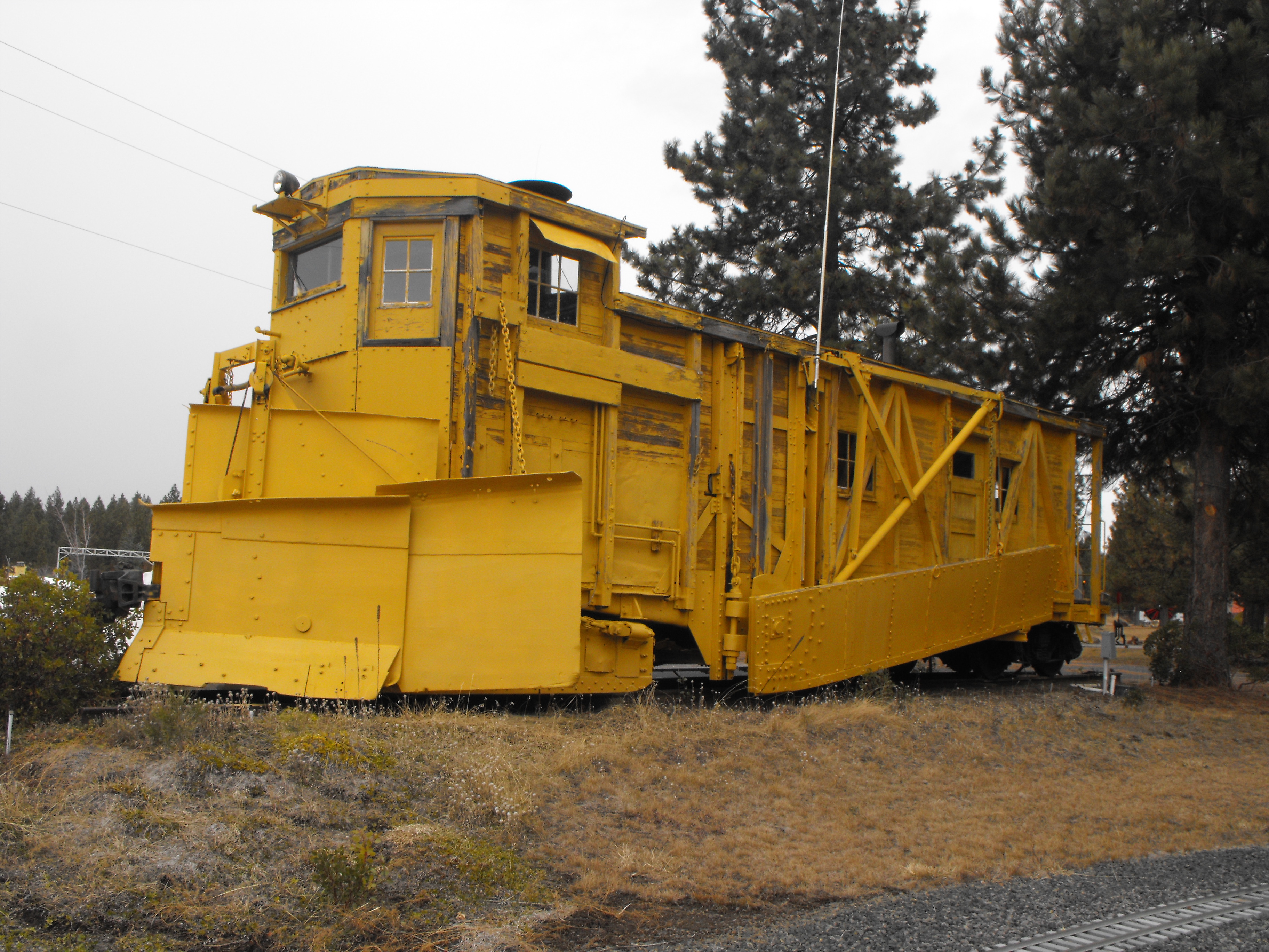 Antique wooden Flanger, former Southern Pacific Railroad SP MWx Flanger, used to remove snow from between the railroad tracks, now on display at Train Mountain Railroad Museum at Chiloquin, Oregon.