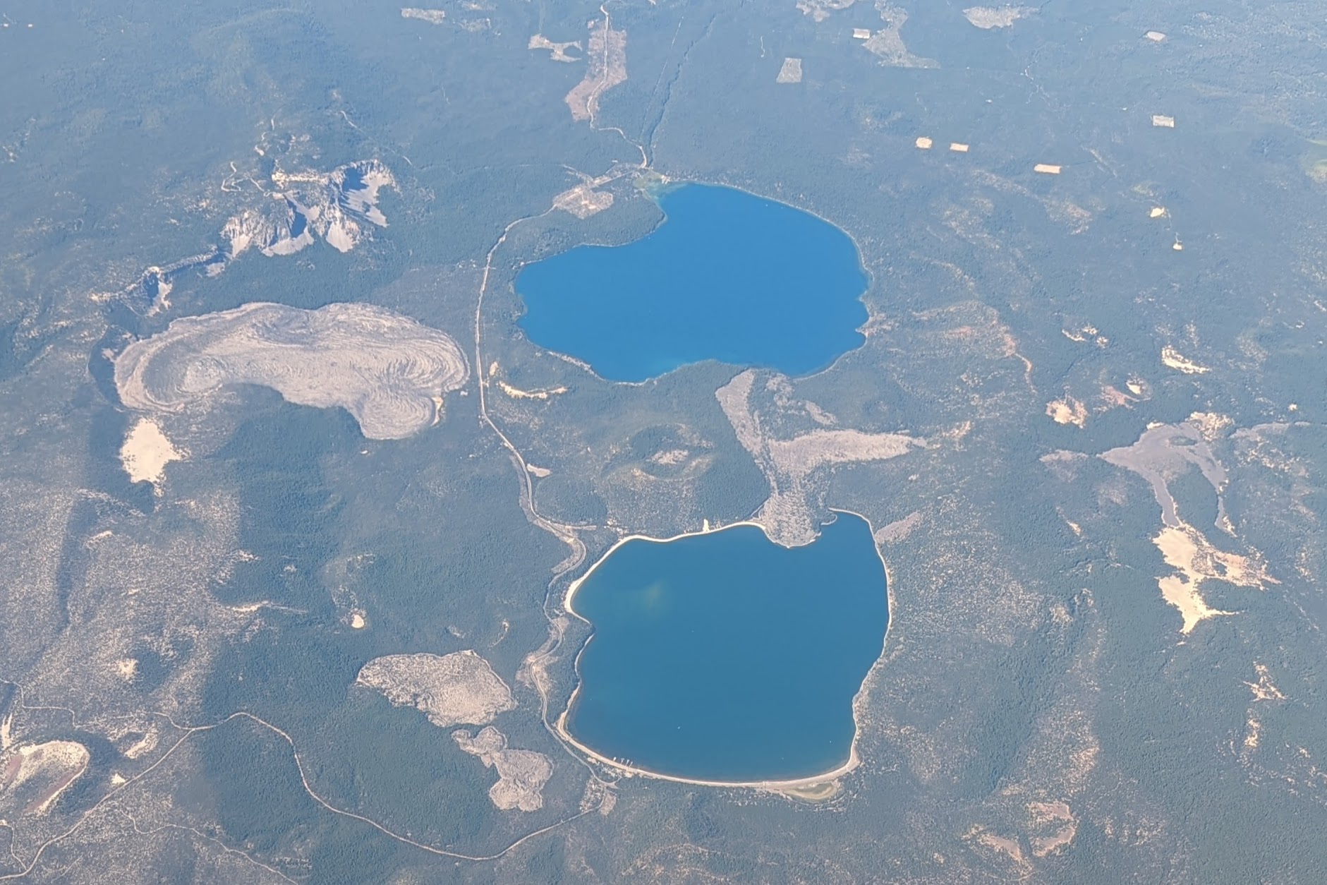 The Newberry Caldera including the Big Obsidian Flow, Paulina Lake, and East Lake, viewed from the east in August, 2022.