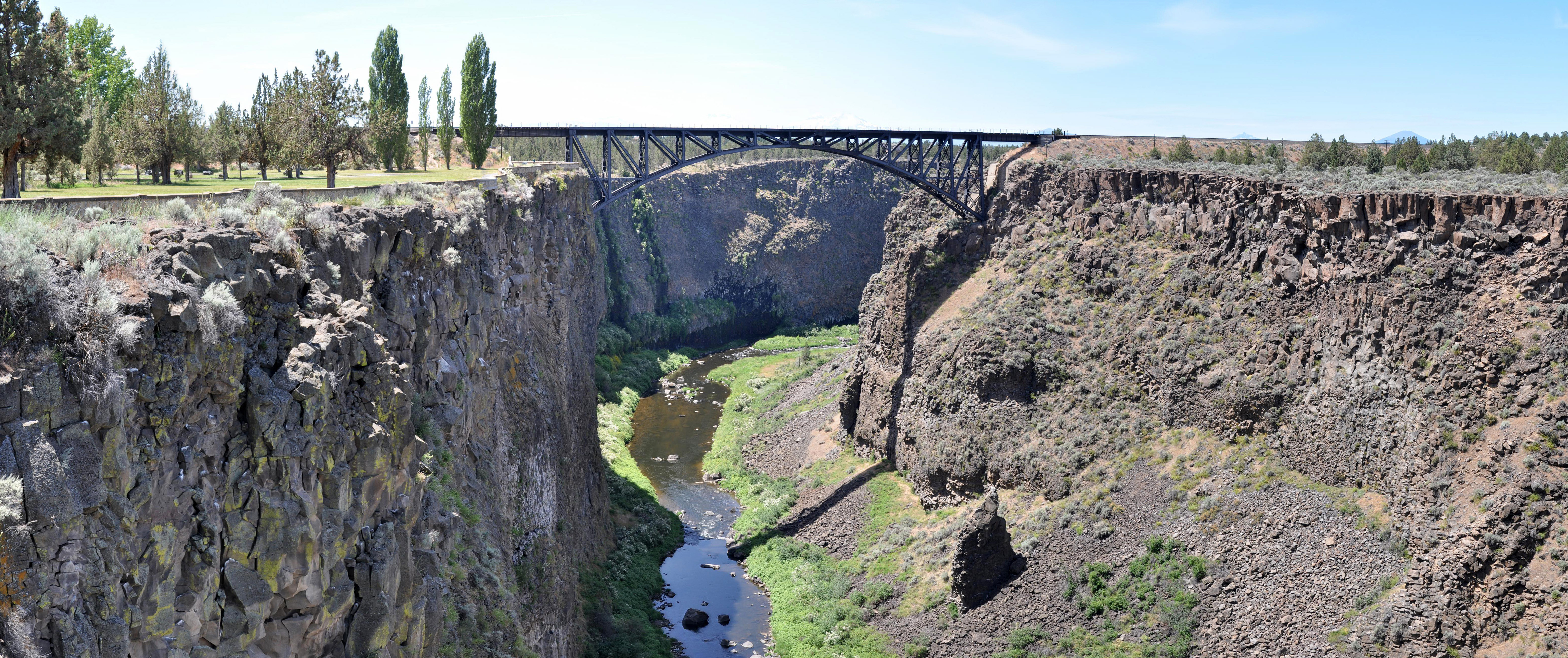 Panorama of Crooked River Canyon at Peter Skene Ogden State Scenic Viewpoint in the U.S. state of Oregon. View is to the west toward the Crooked River Railroad Bridge from the Crooked River High Bridge. Originally 16 vertical images.