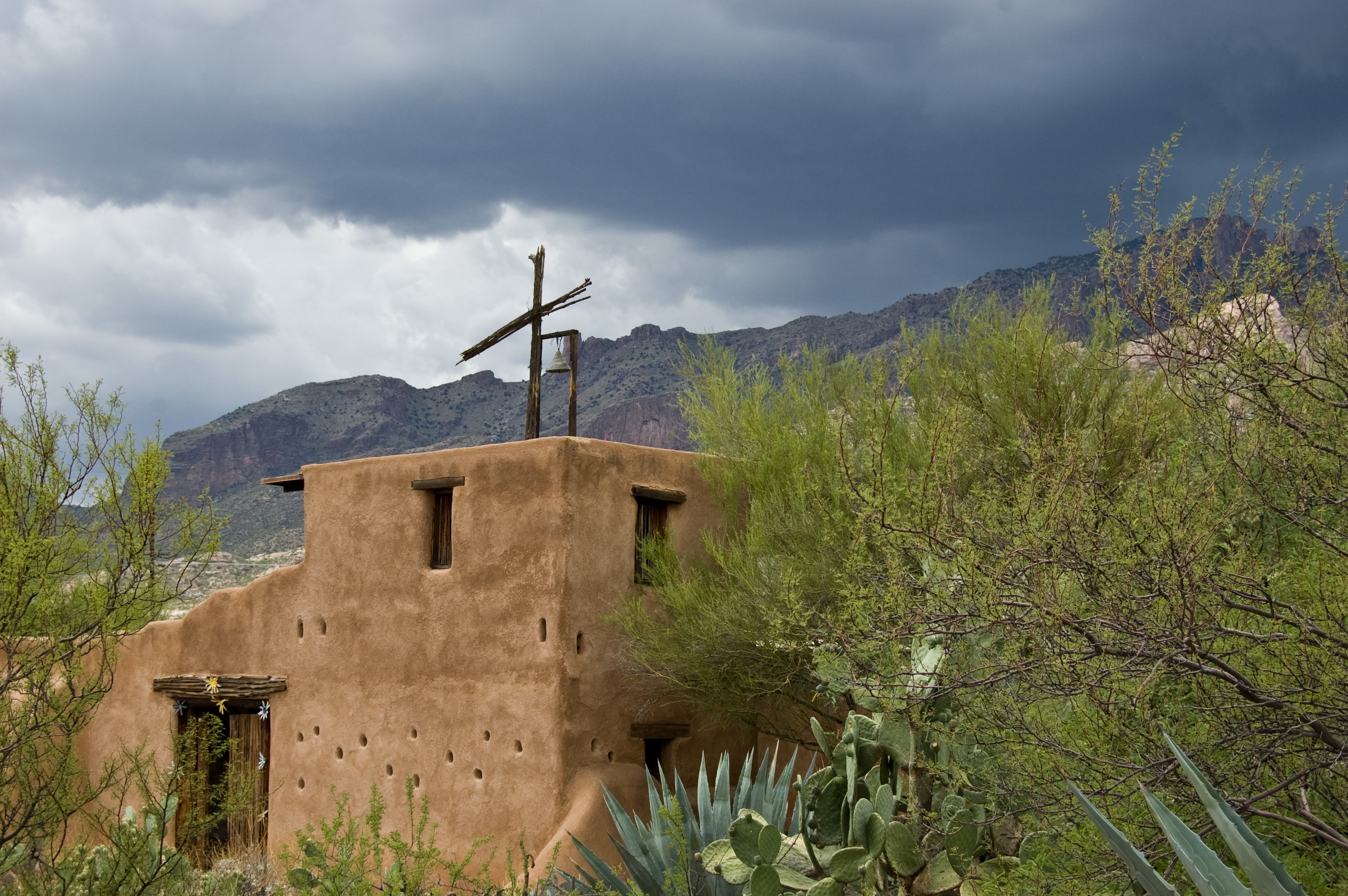 This small chapel is on the grounds of the De Grazia Gallery in the Sun in Tucson, Arizona. The artist built his own gallery in the foothills of the Catalina Mountains. When we visited, there was a thunderstorm in the mountains that provided a dramatic backdrop.