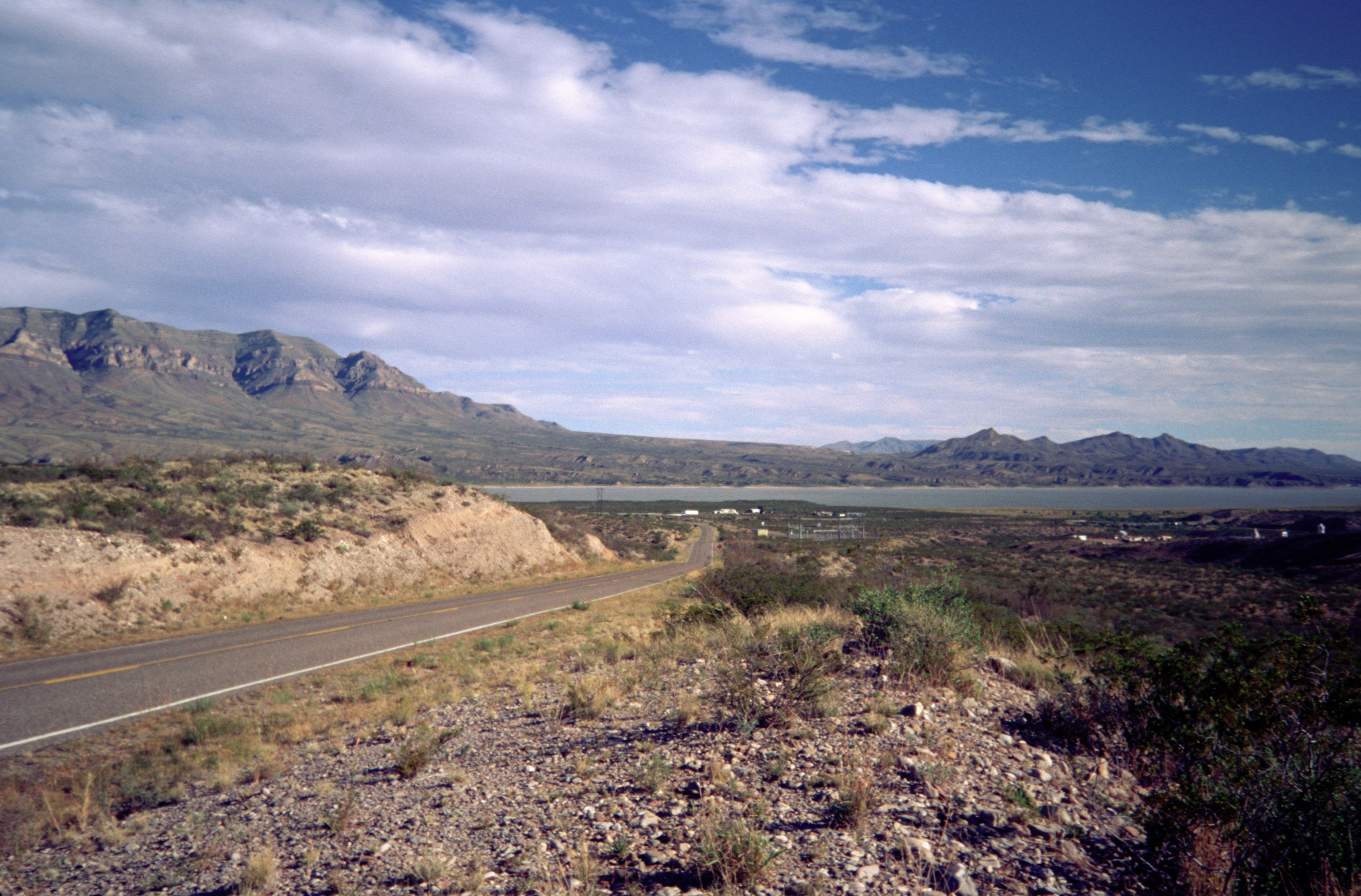 Scope and content:  The original finding aid described this photograph as:
Original Caption: The impressive Caballo Mountains tower over Caballo Lake and the Rio Grande valley, and are a landmark that can be seen for miles.
Location: Location: New Mexico (32.919° N 107.319° W)

Status: Public domain. Photo by Miller Photography Studio