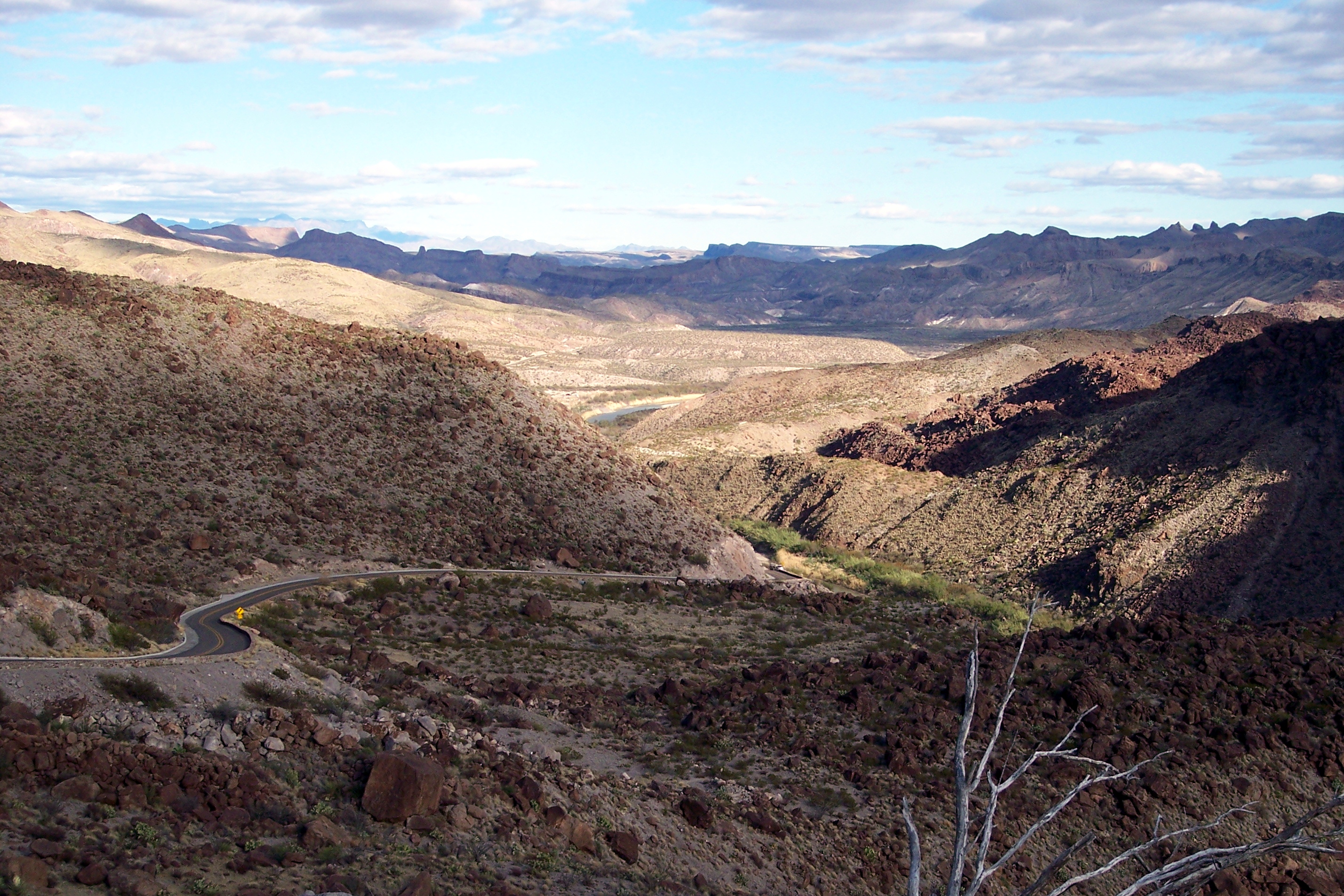 Big Bend National Park landscape including road and Rio Grande river, near Santa Elena Canyon, looking east.
