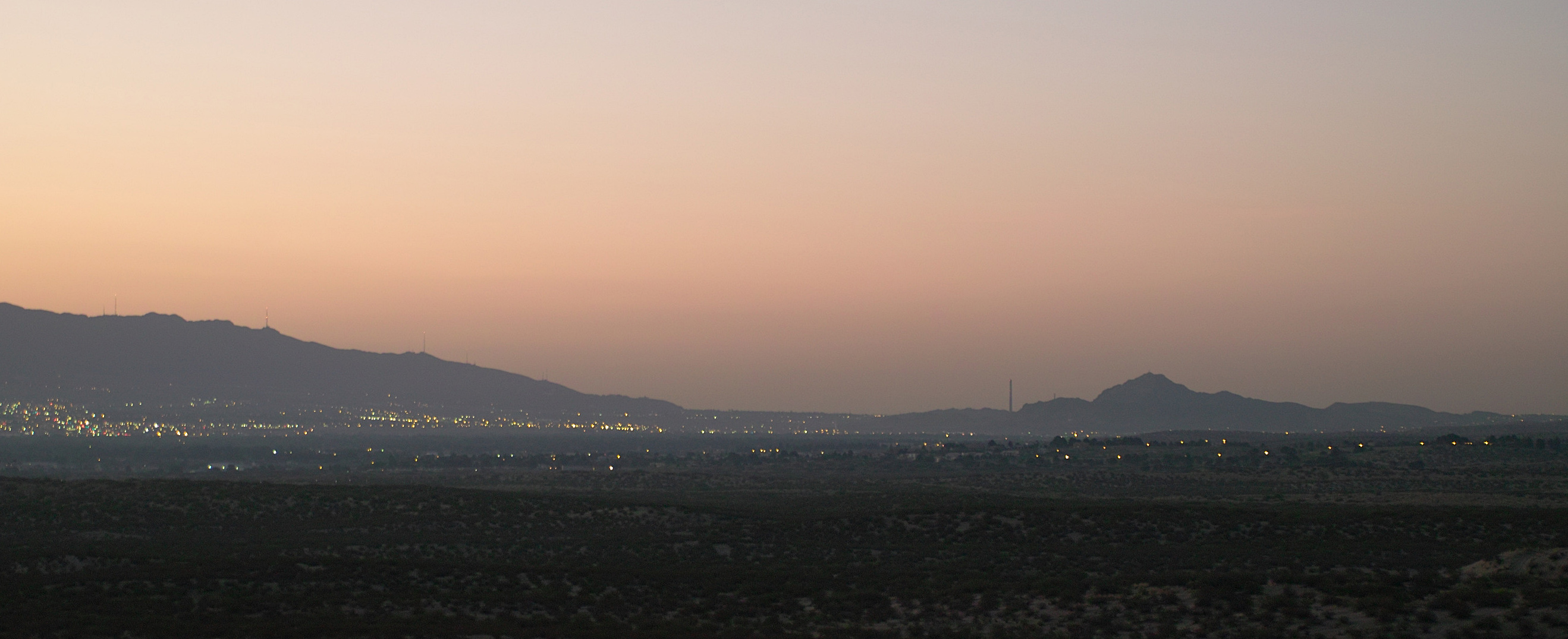 View of the west side of El Paso, Texas, and the Franklin Mountains, from Santa Teresa NM, 5:30 AM Sept. 29, 2012