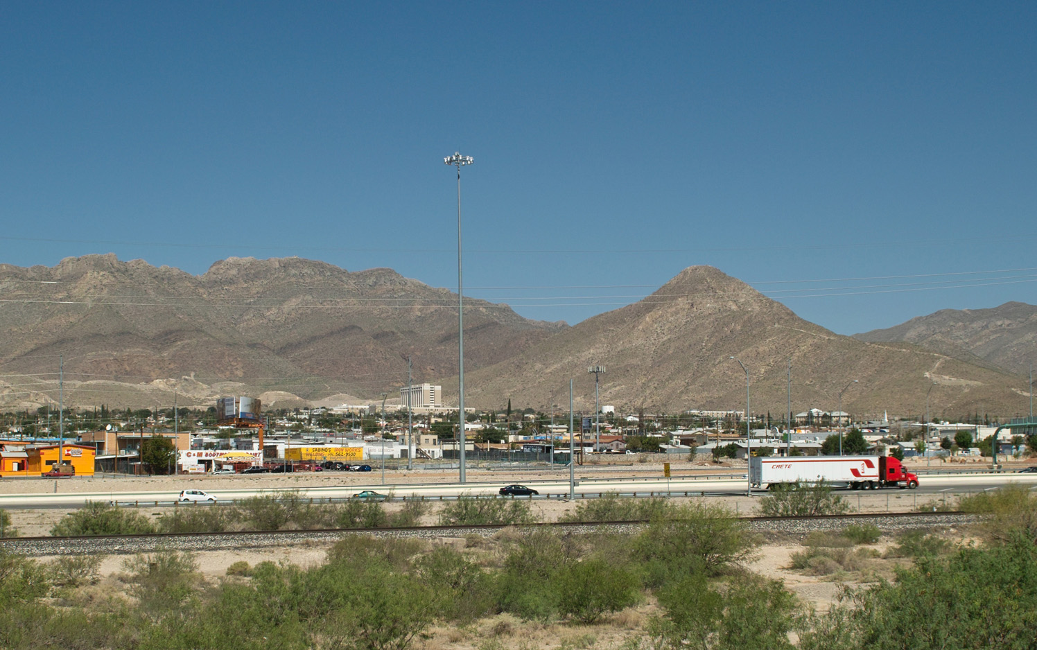 A view of Sugarloaf Mountain, El Paso, Texas, taken to match the view at File:Camping on the Border, near El Paso, Texas.jpg, from near the Cassidy Road entrance to Fort Bliss, July 2012